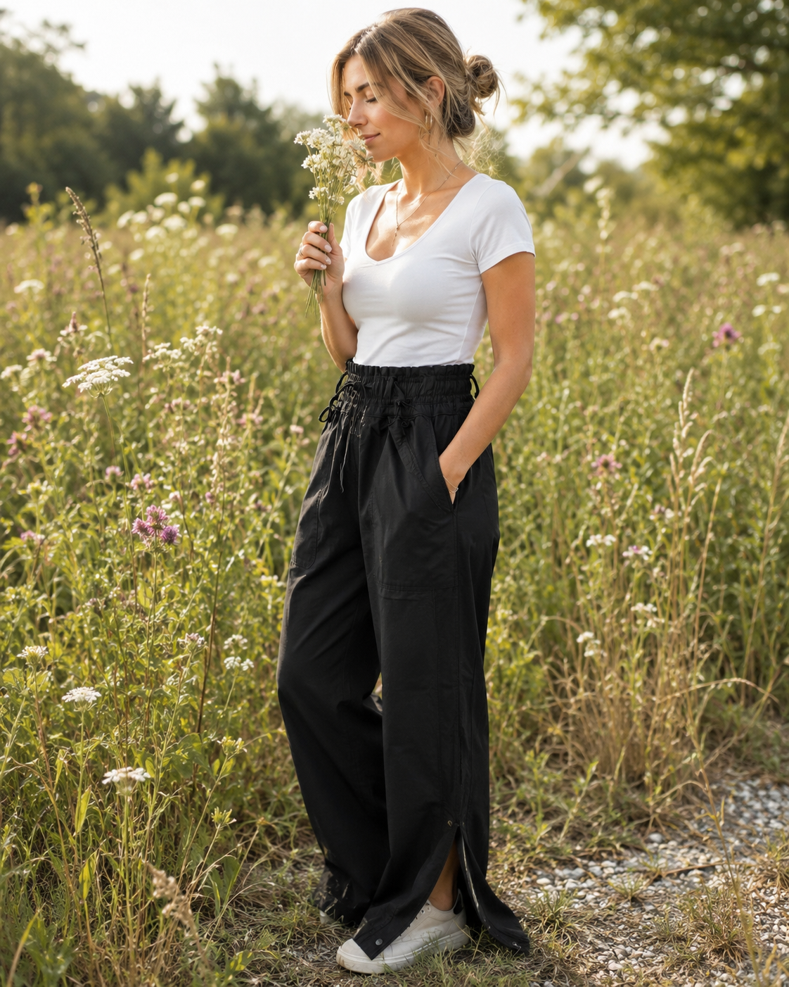 Athleta black cinch waist zip vent pants size 6 with crisp nylon blend fabric from Adored Again boutique