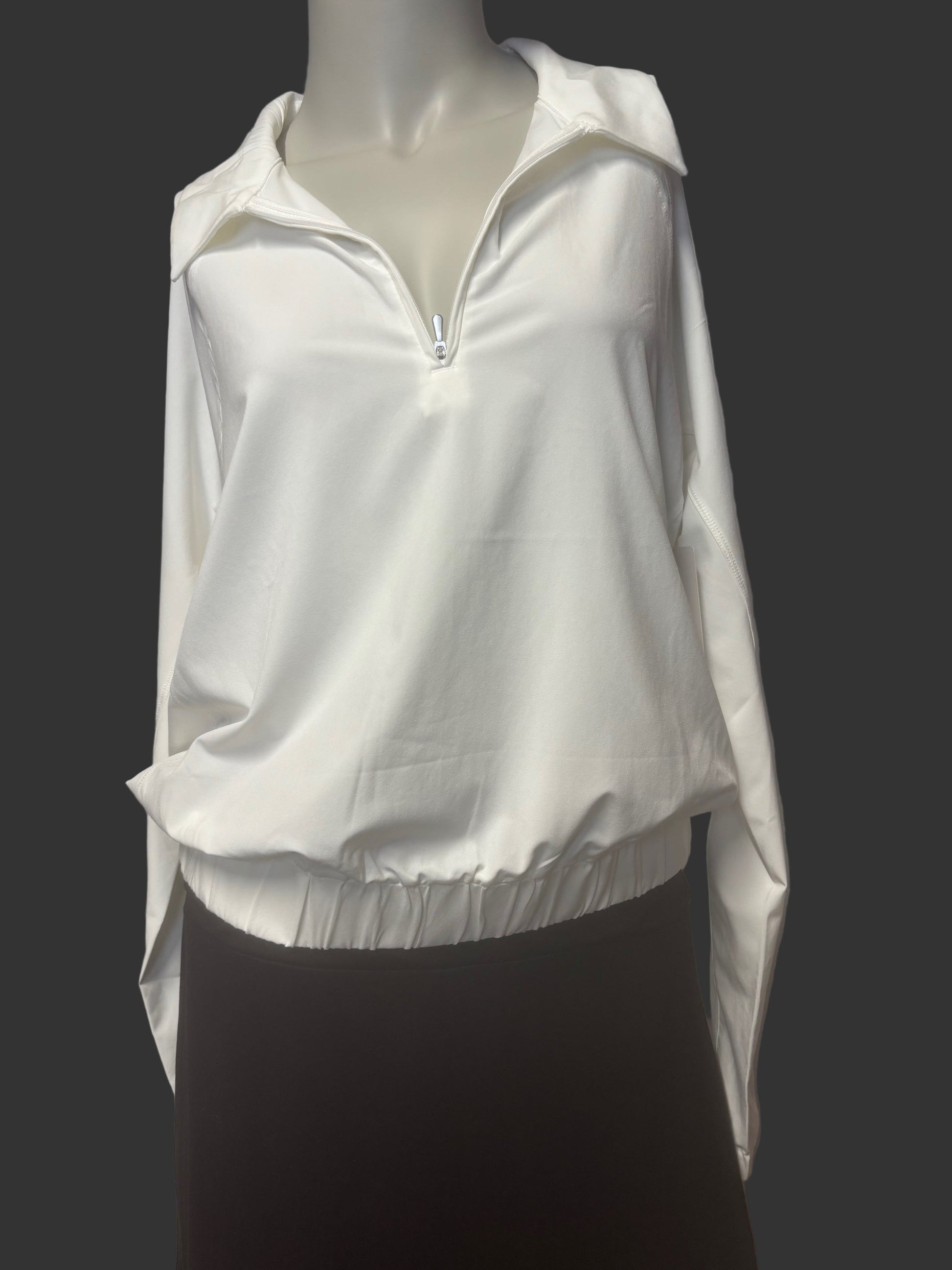 Athleta cream half-zip pullover size M - front view, collar, elastic waist. Bubble effect over waistband.