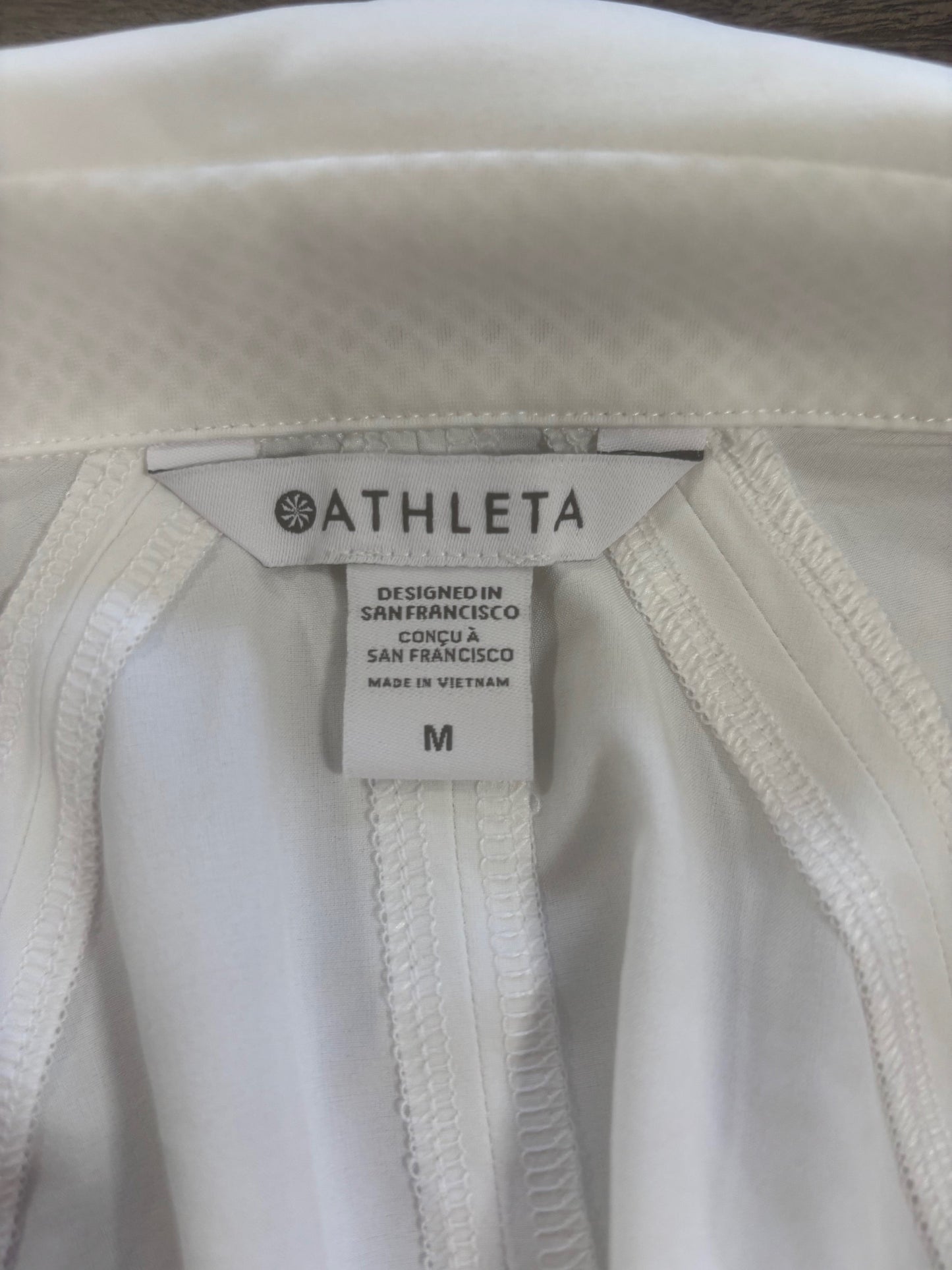 Athleta cream half-zip pullover size M-official tag, wicking fabric around collar