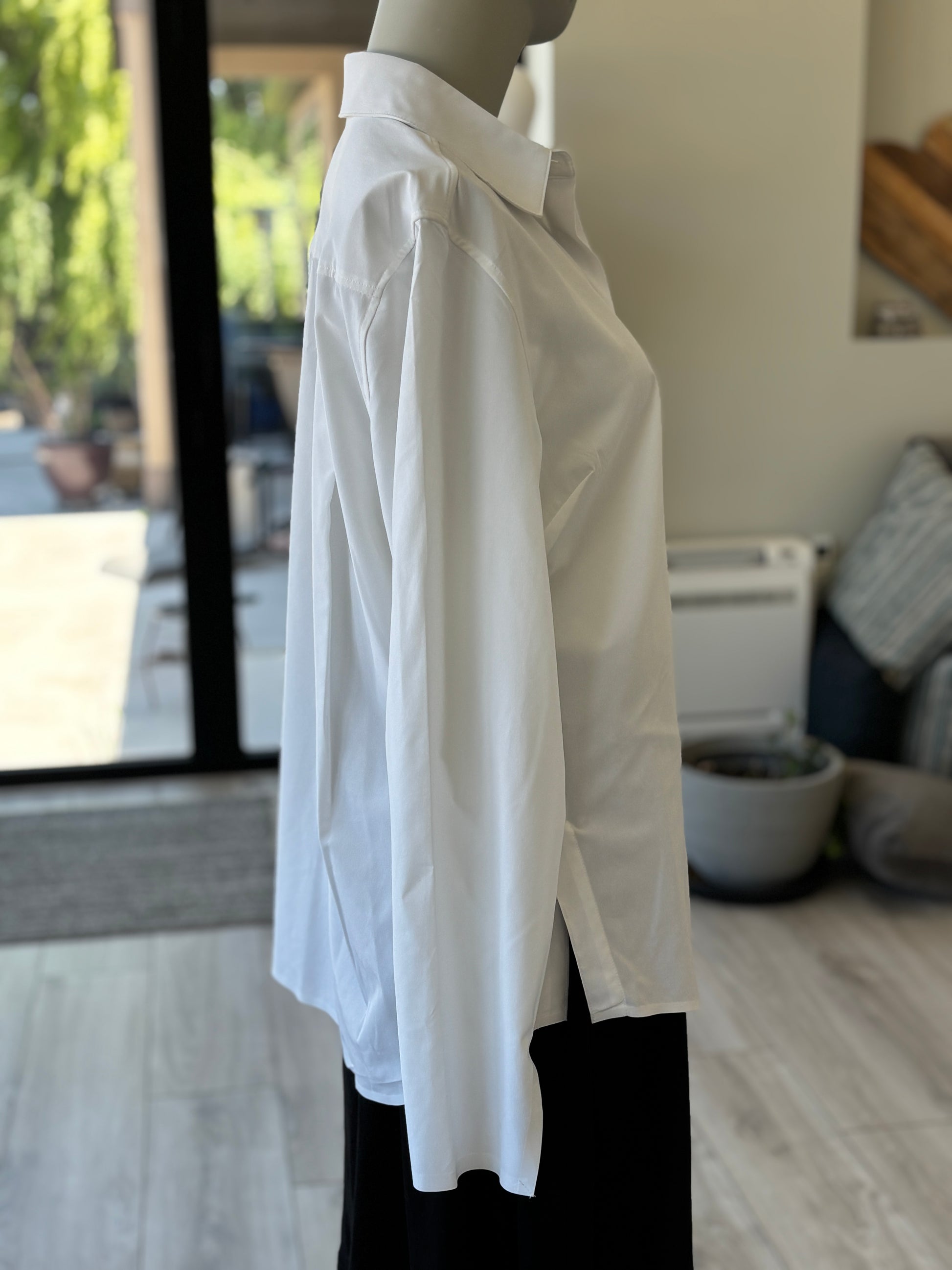 White Athleta collared blouse with hidden button front and lightweight performance fabric