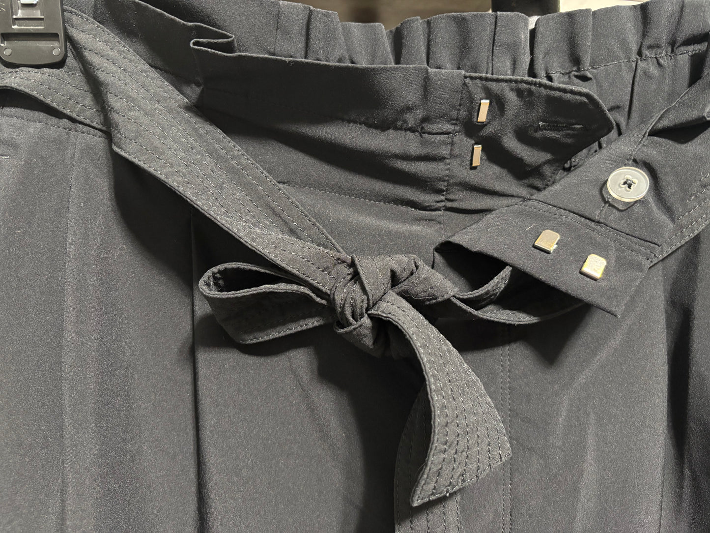 Athleta Black Dress pants, clasp and button closures, zipper, ruffle detail on top. Straight leg