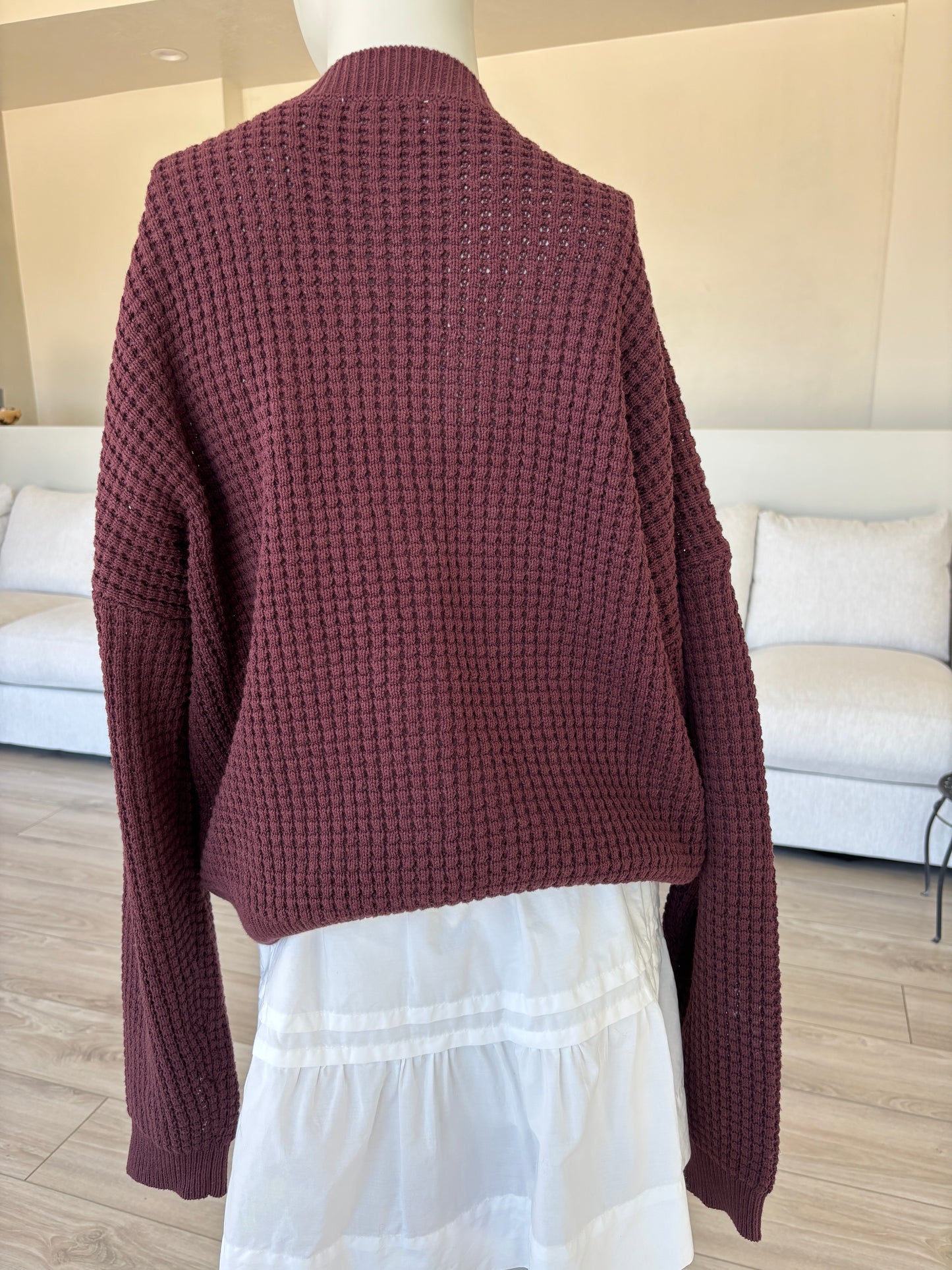 BOHME cotton blend V-neck sweater in deep maroon from Adored Again boutique