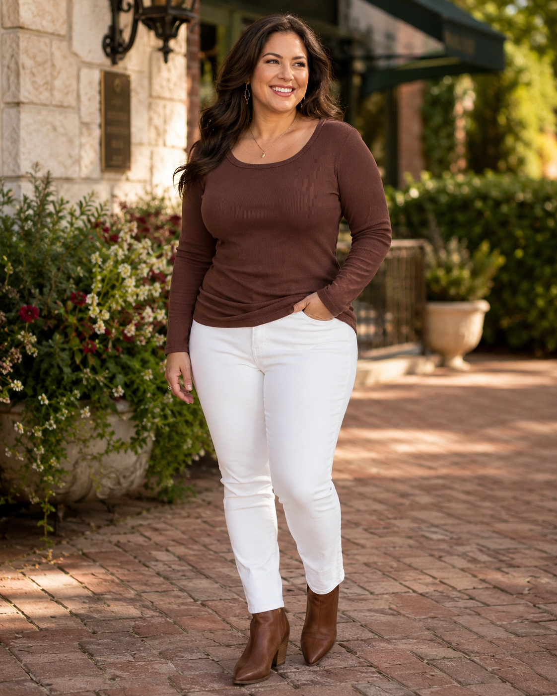Chocolate brown fitted ribbed top size L styled with white pants and brown boots for an elevated everyday outfit
