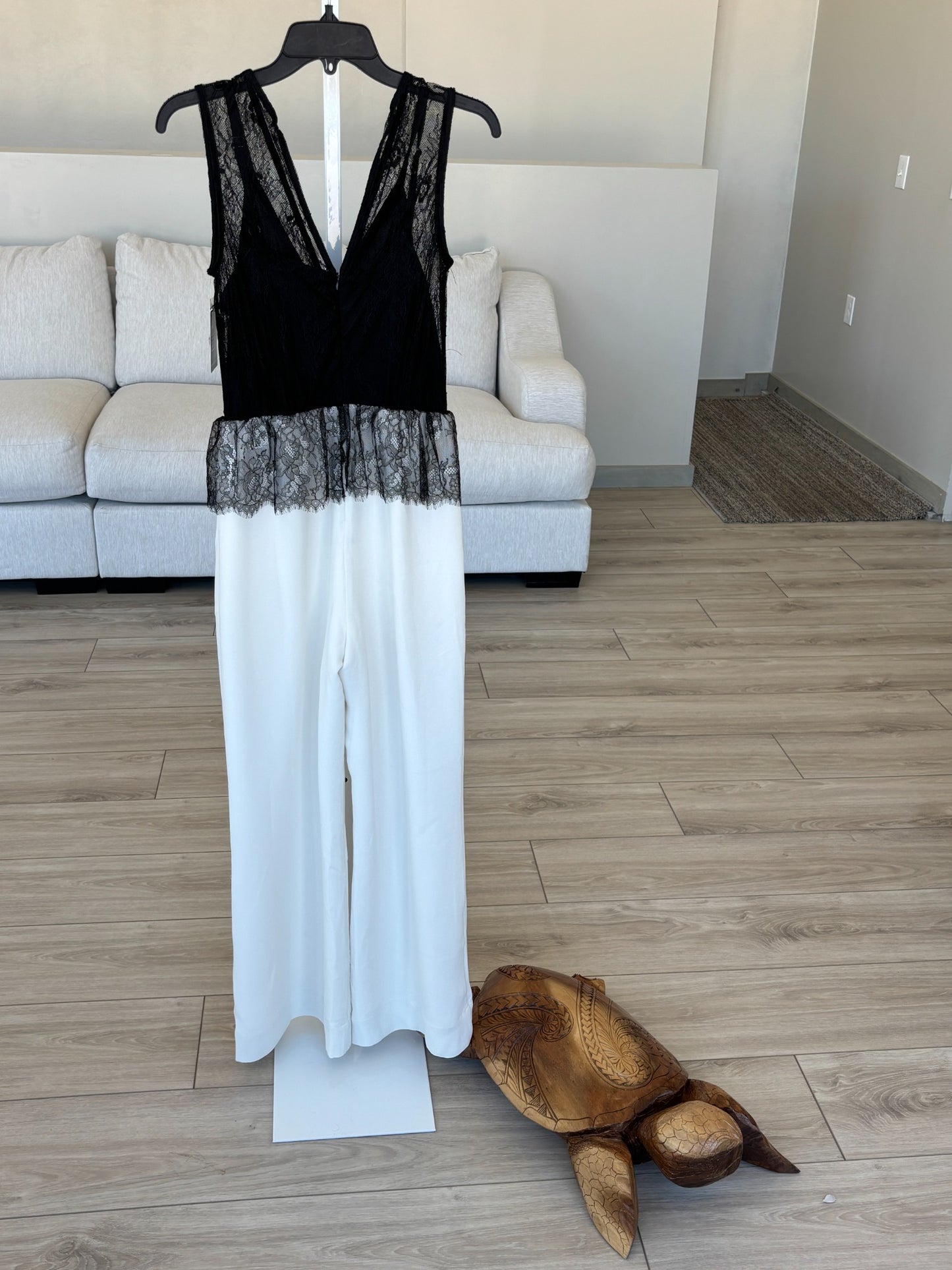 Boston Proper sleeveless jumpsuit with sheer lace shoulders and surplice neckline