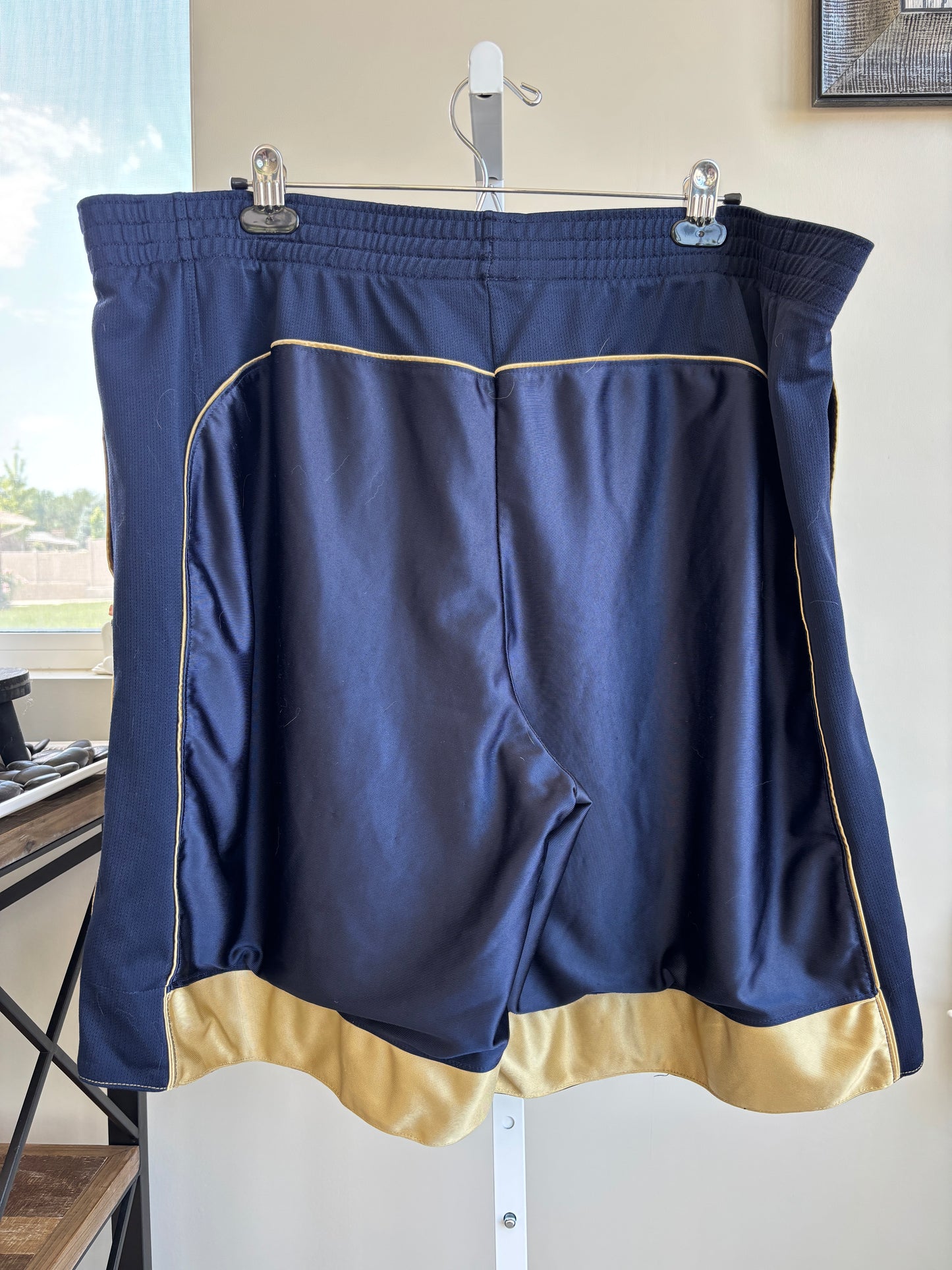 Champion men’s 2XL navy athletic shorts with gold side stripes