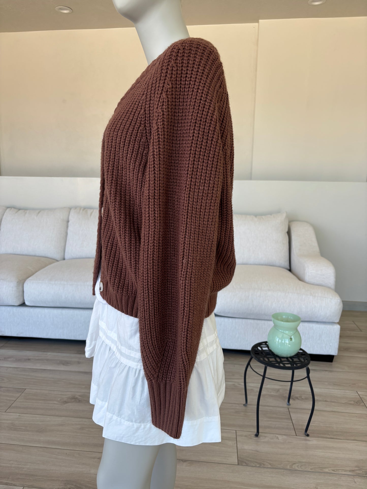 Brown acrylic knit button up cardigan styled for cozy everyday layering