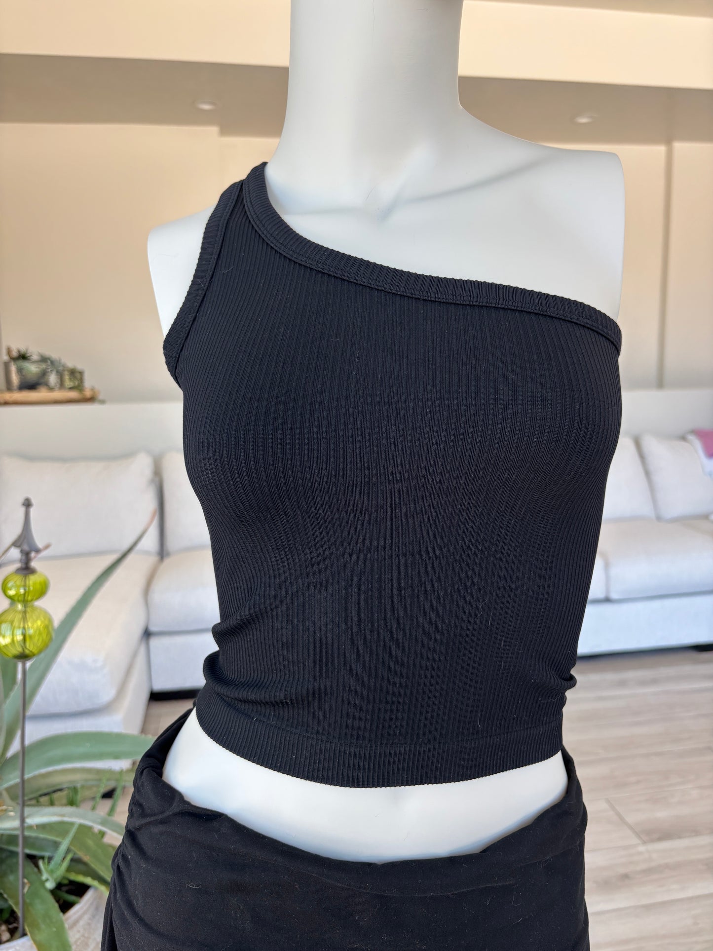 Fornia black ribbed crop top size S/M with fitted one-shoulder silhouette