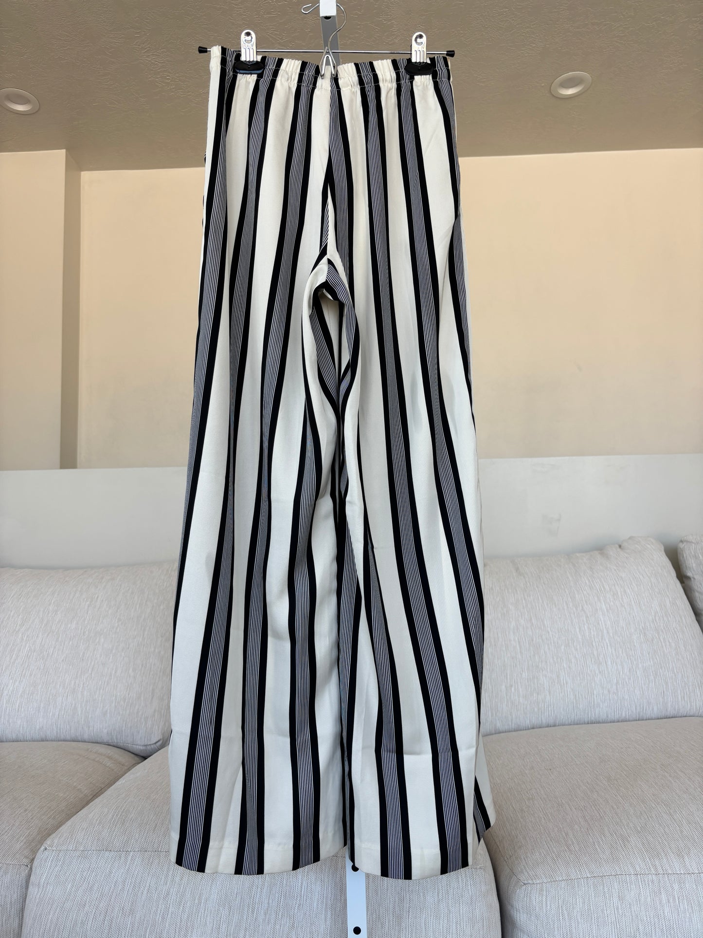 New-with-tags H&M striped satin dress pants featuring a comfortable elastic waist and flowing wide legs.