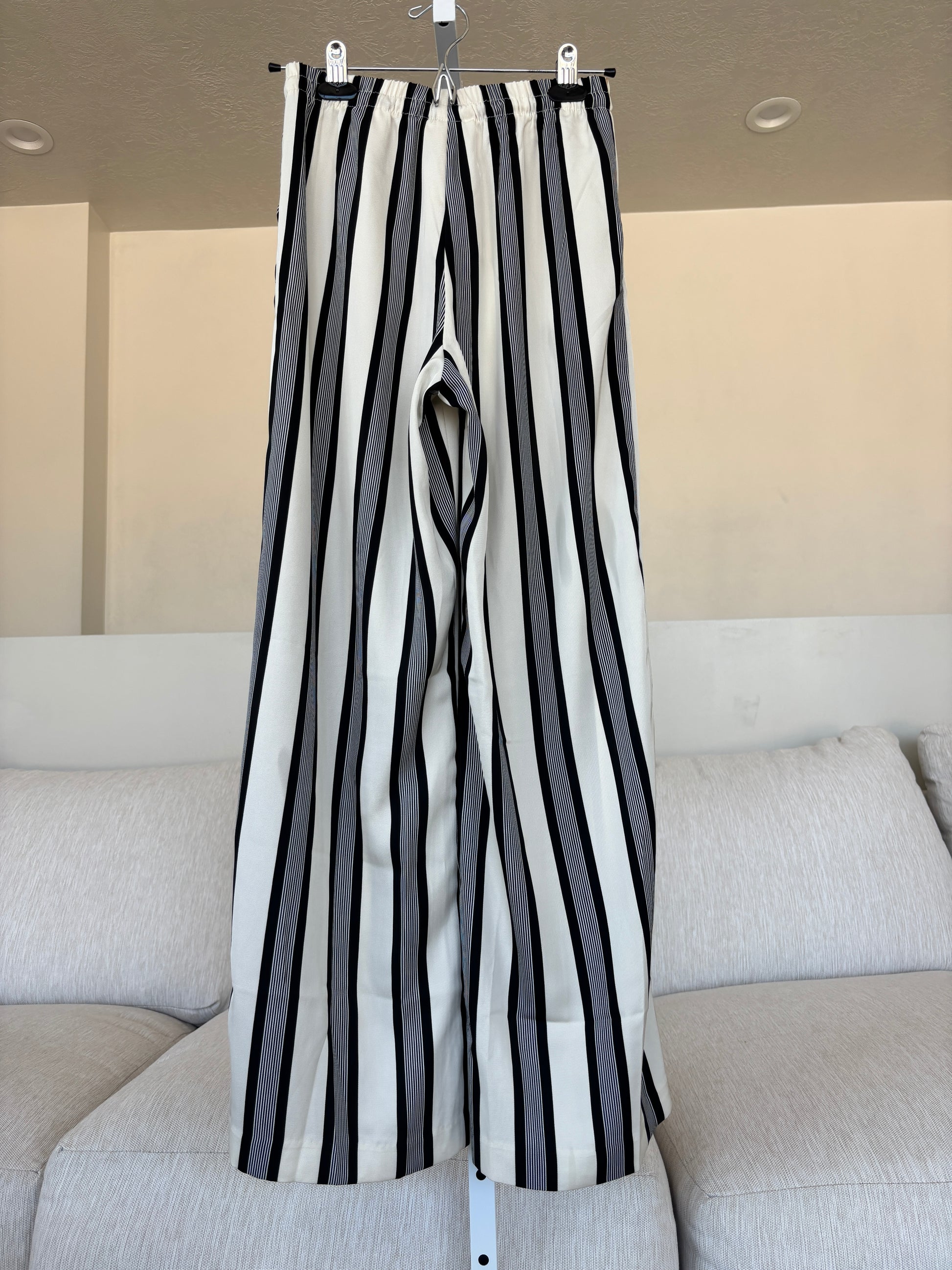 New-with-tags H&M striped satin dress pants featuring a comfortable elastic waist and flowing wide legs.
