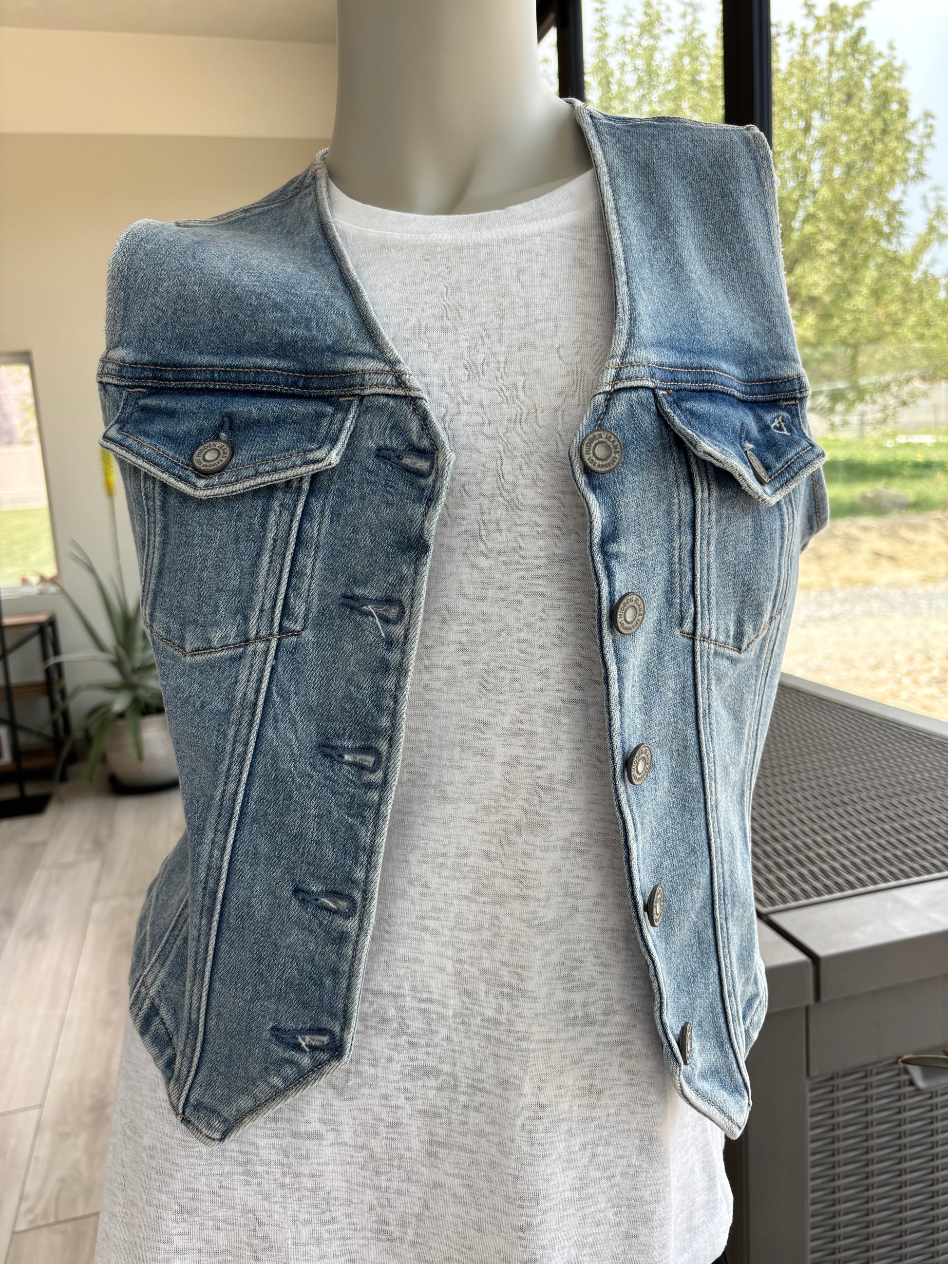 Hidden sleeveless denim vest with chest pockets and silver tone buttons size M