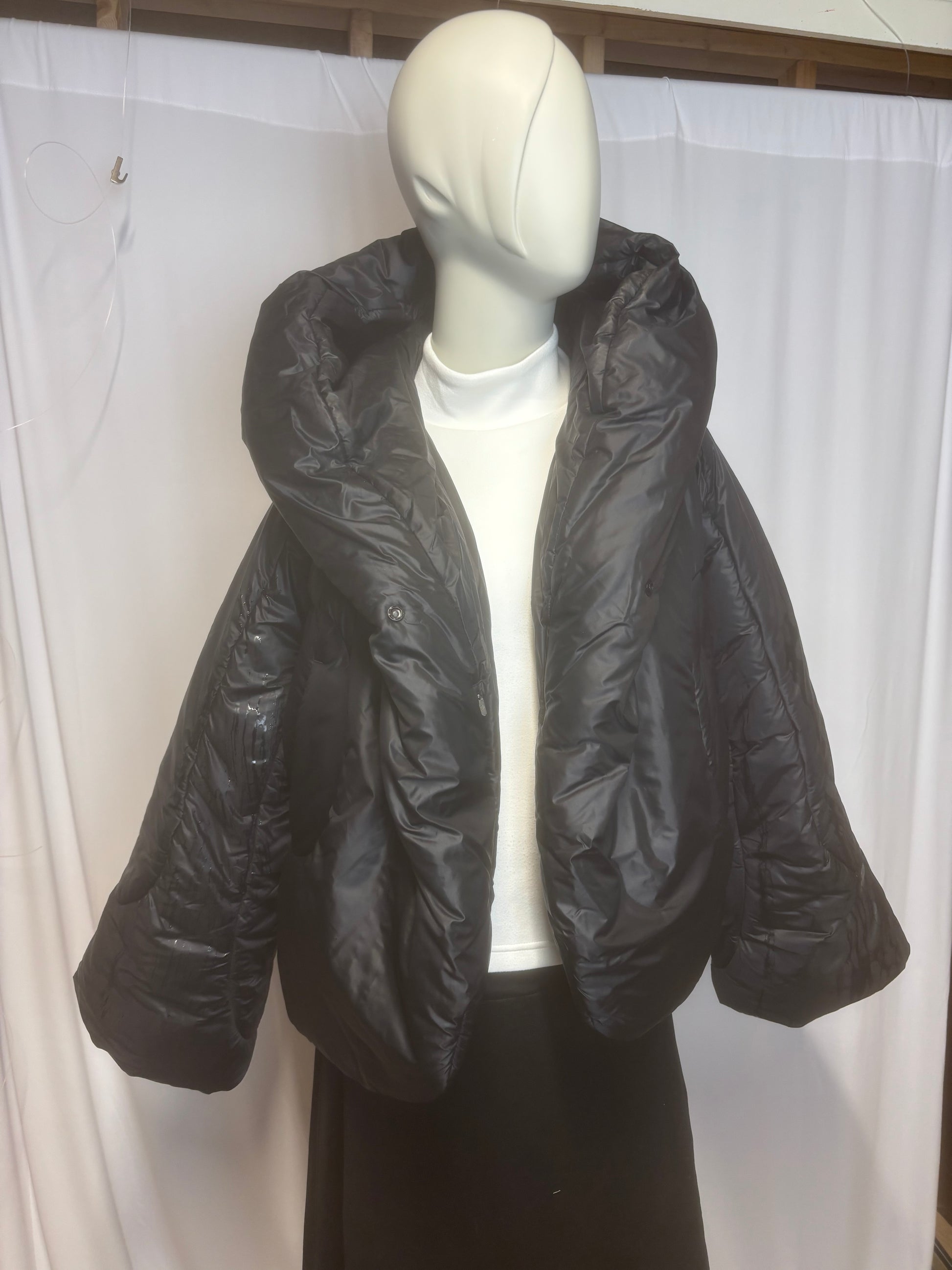 Lululemon - Bougie Black Puffer Short Hooded Coat - Size 0 Zipper at bottom of label for pocket.