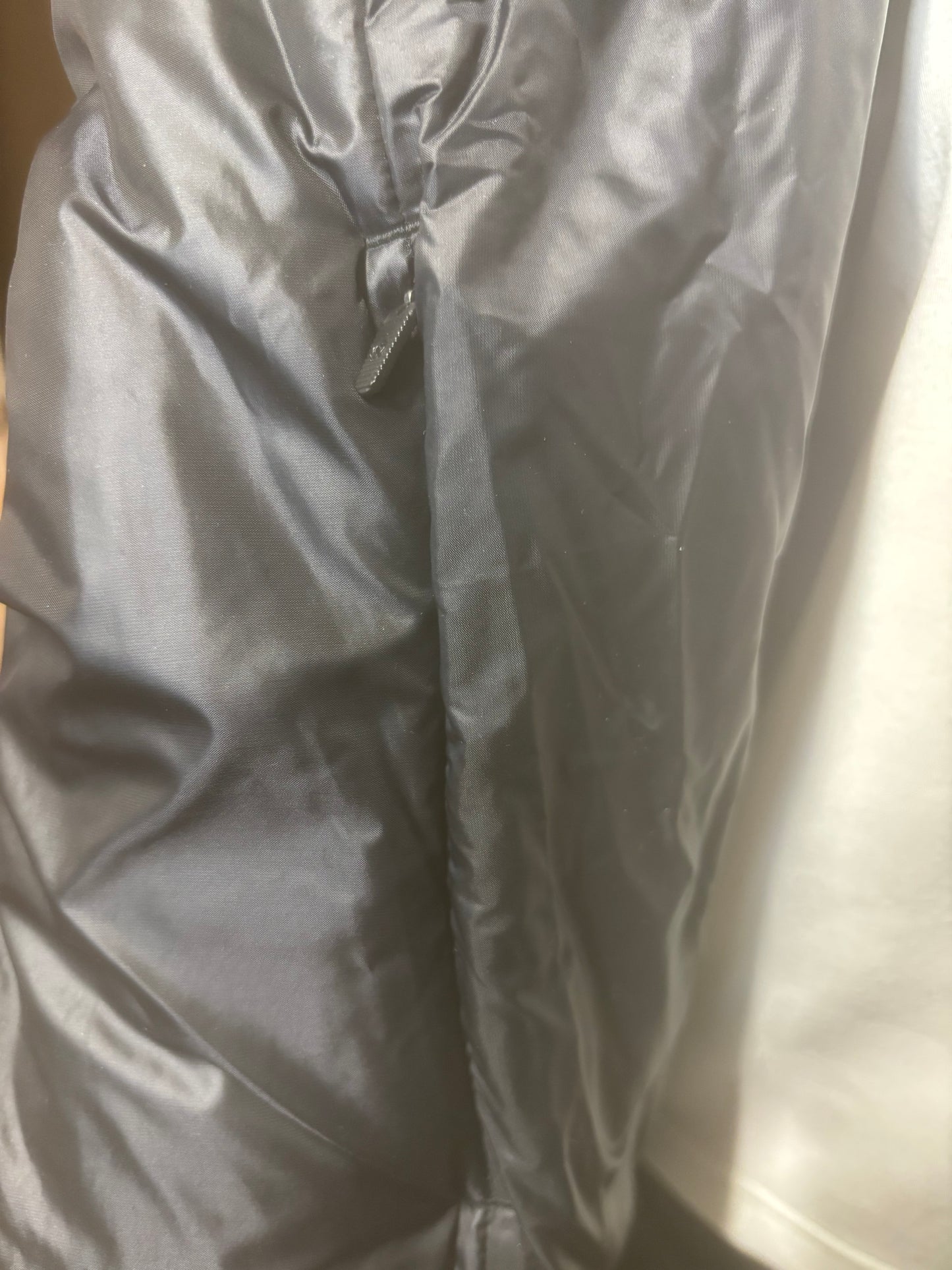 Lululemon - Bougie Black Puffer Short Hooded Coat - Size 0 - hidden pocket at the bottom of lapel.