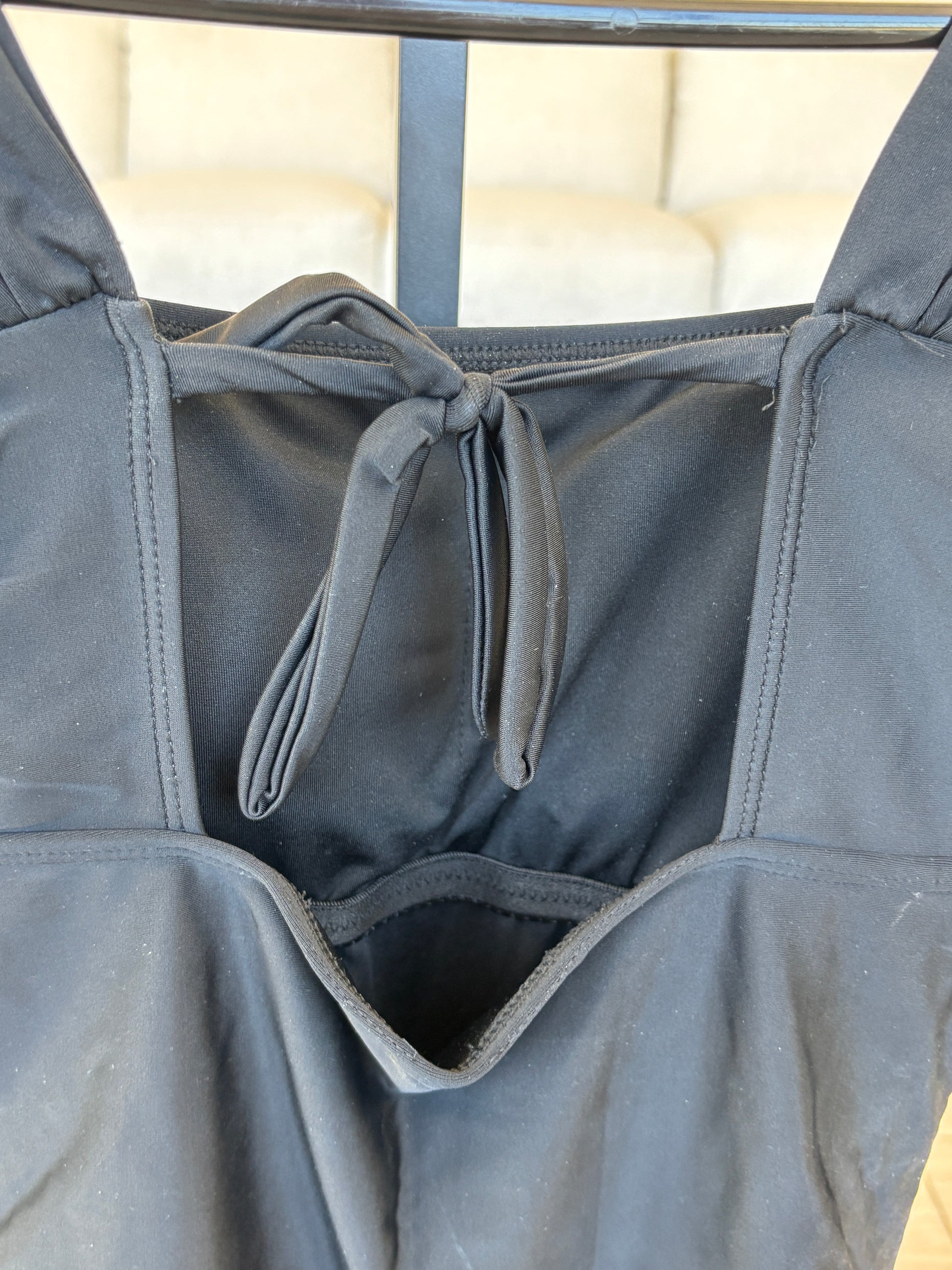 Flattering black Janela Bay swimsuit with wide straps and ruching