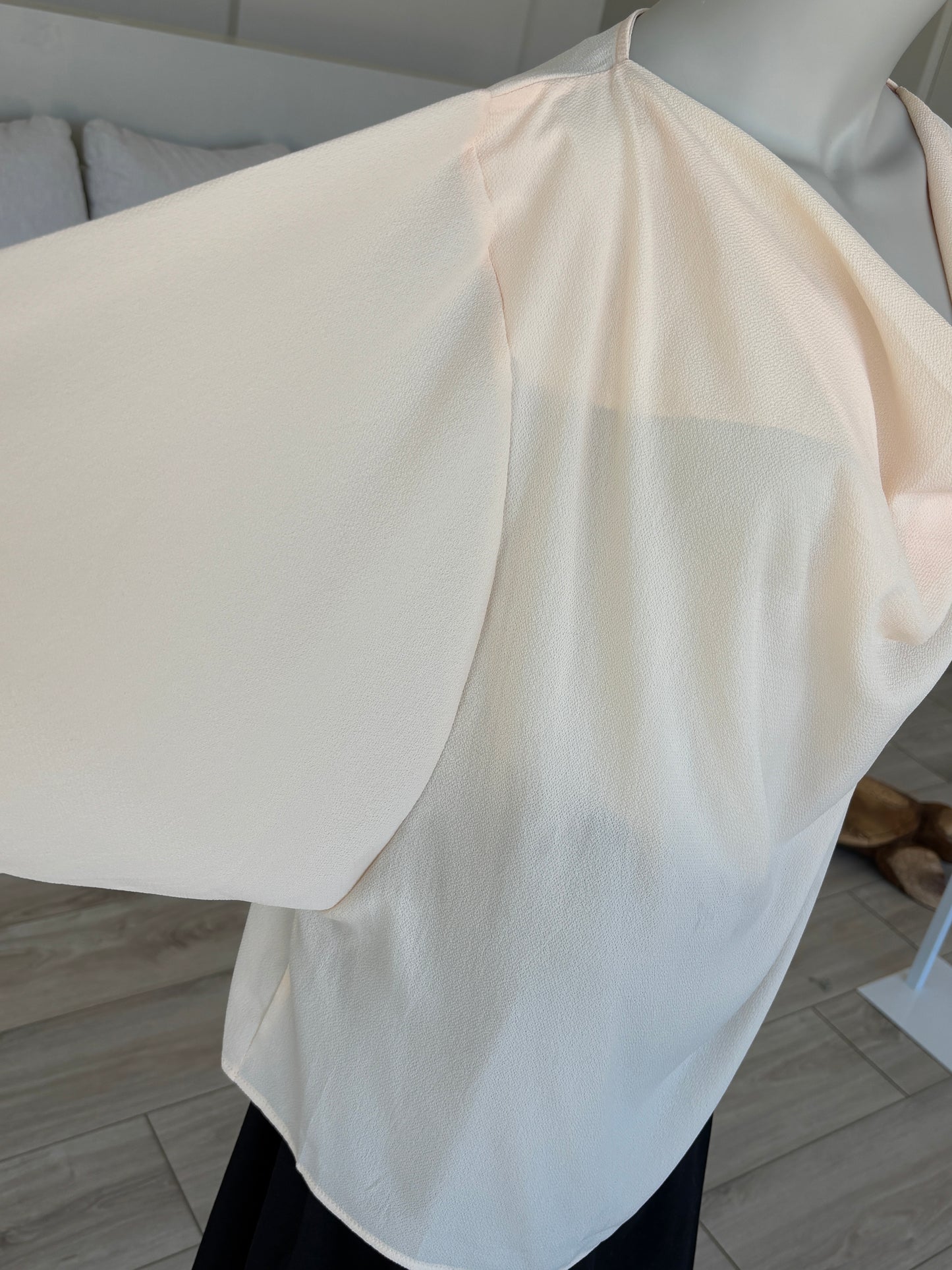 Peach relaxed fit blouse with draped front and soft lightweight fabric