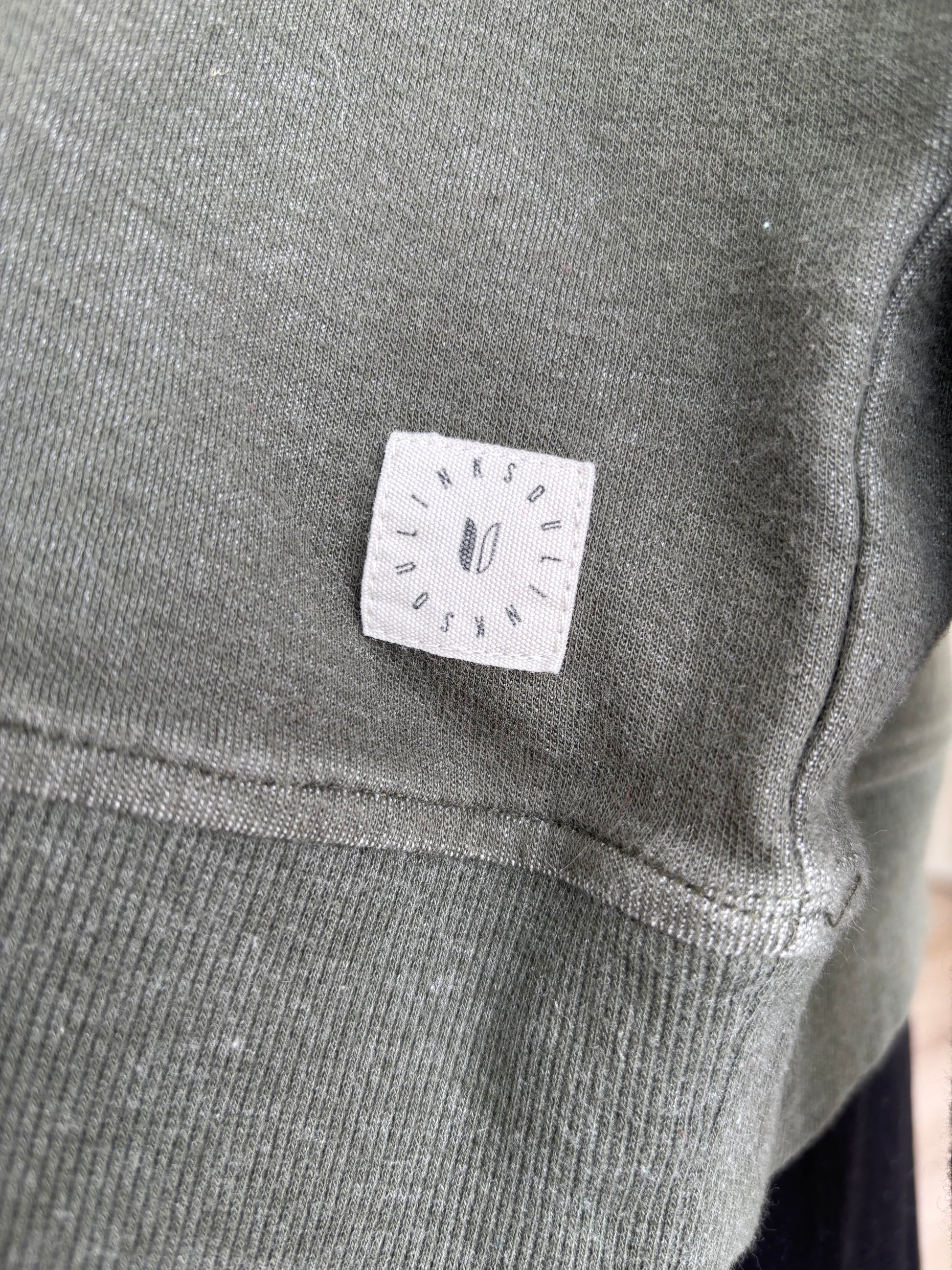 Linksoul Logo on earthy green sweatshirt sporty golf sweatshirt
