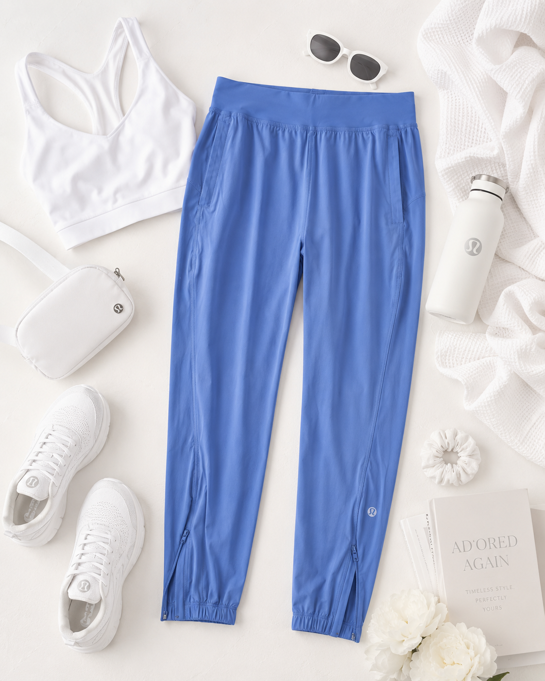 Blue Lululemon jogger pants size 6 with zip ankle detail elastic hem and sporty polished athleisure style