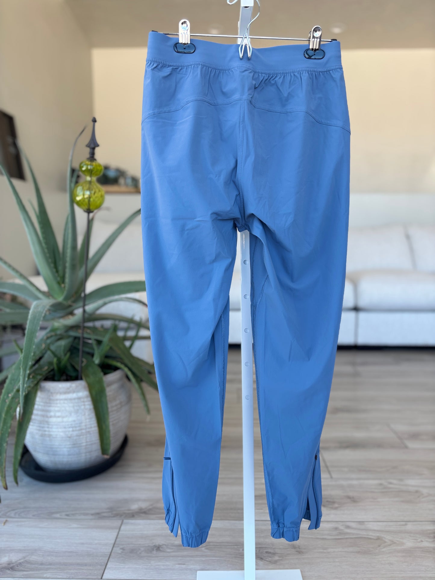 Lululemon blue jogger pants size 6 with technical stretch fabric and versatile zip ankle design from Adored Again boutique