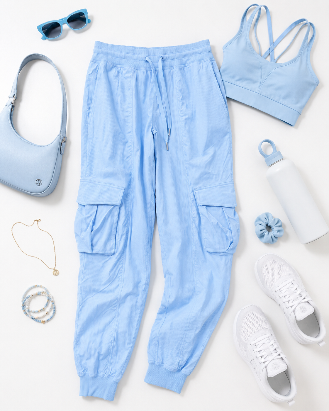 Light blue Lululemon jogger pants size S with cargo pockets jogger cuffs and lightweight crisp fabric