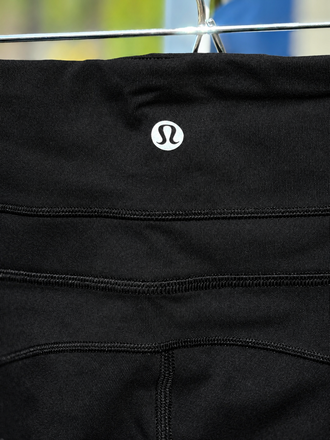 Women’s Lululemon full-length black Luon pants with supportive four-way stretch and a 32-inch inseam in size 8.