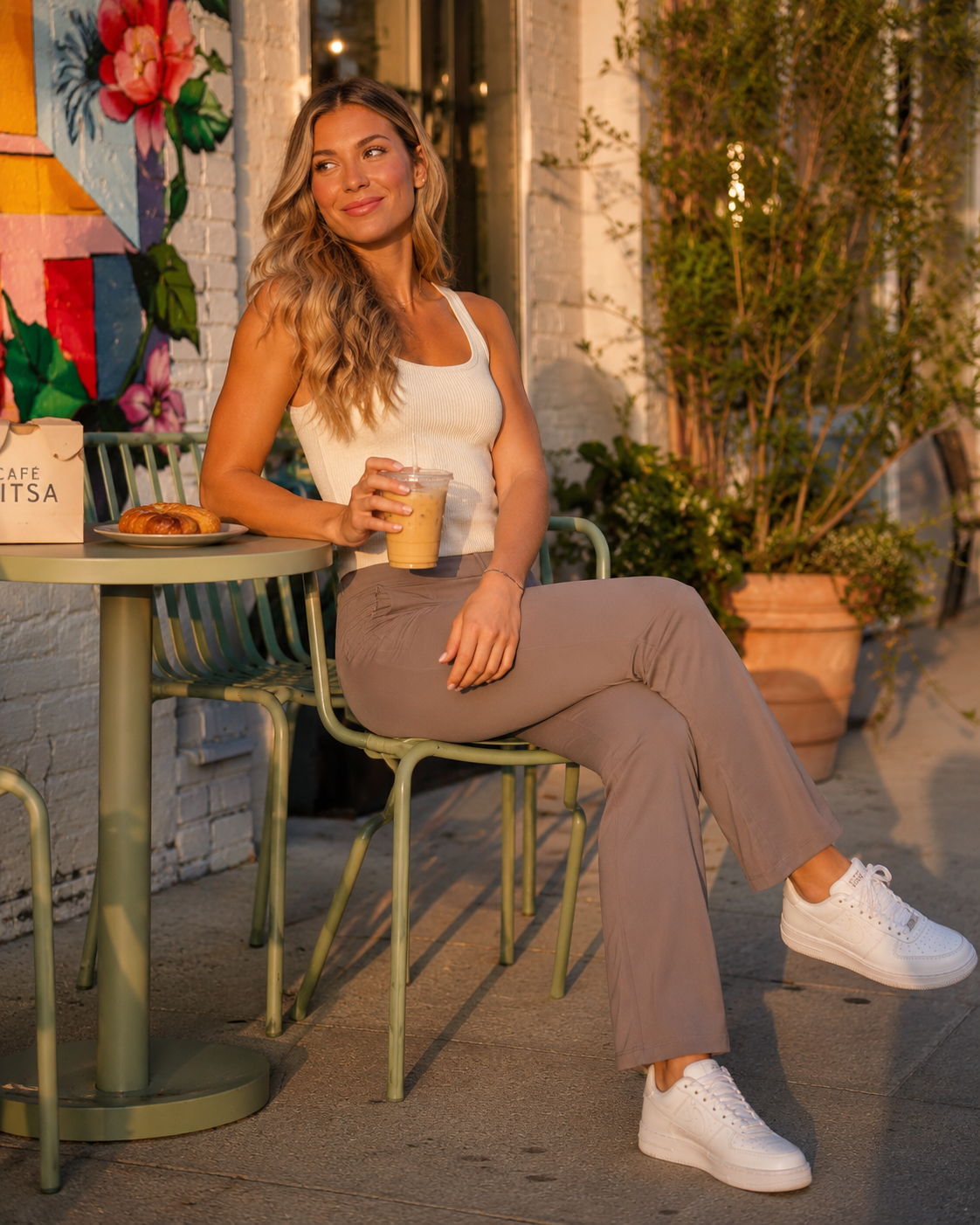 Lululemon khaki taupe athleisure pants with side zip pockets and performance stretch fabric from Adored Again boutique