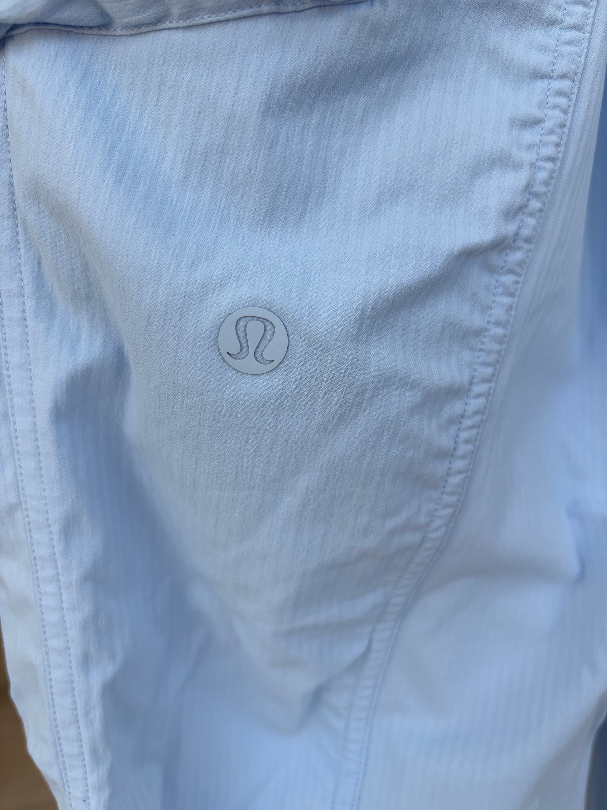 Women’s Lululemon cargo joggers in light blue size small with stretch nylon fabric and jogger ankle cuffs