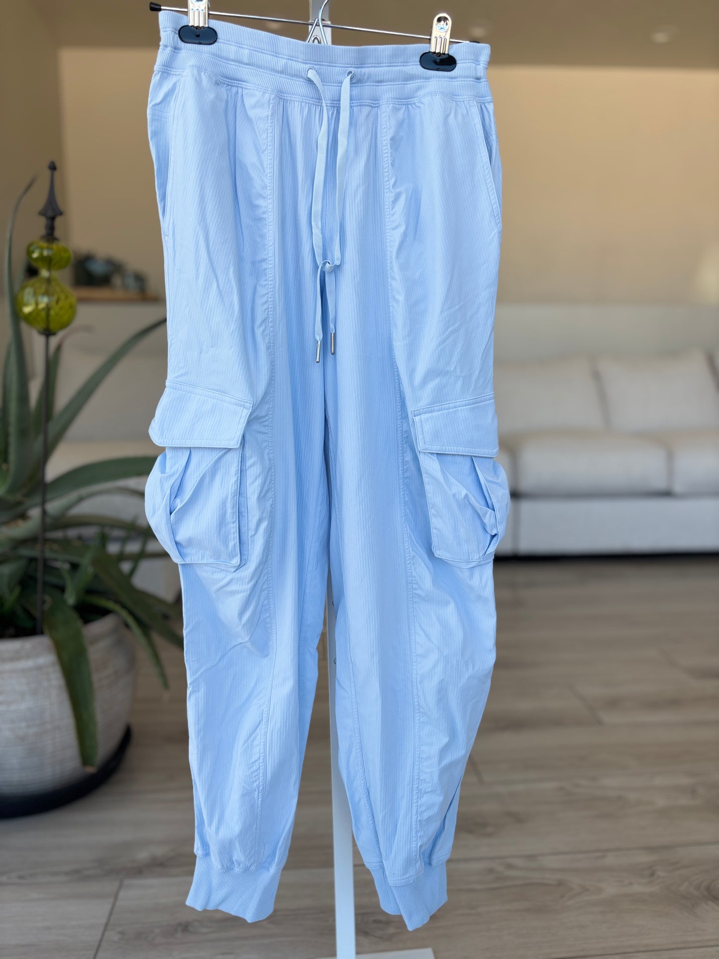 Lululemon blue utility joggers size small with pleated cargo pockets and relaxed athleisure silhouette from Adored Again boutique