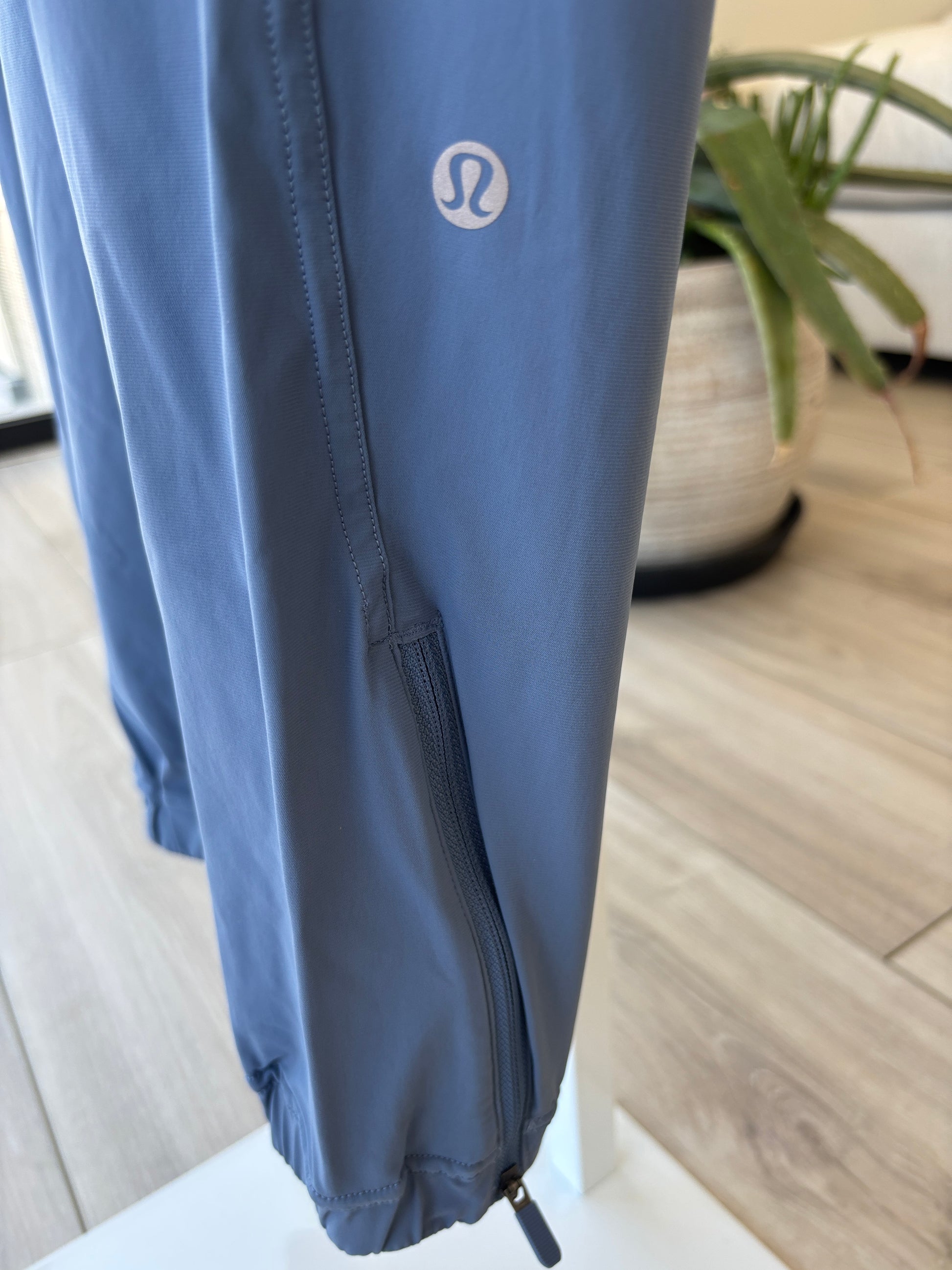 Lululemon blue performance joggers size 6 styled for travel errands walking and elevated everyday athleisure