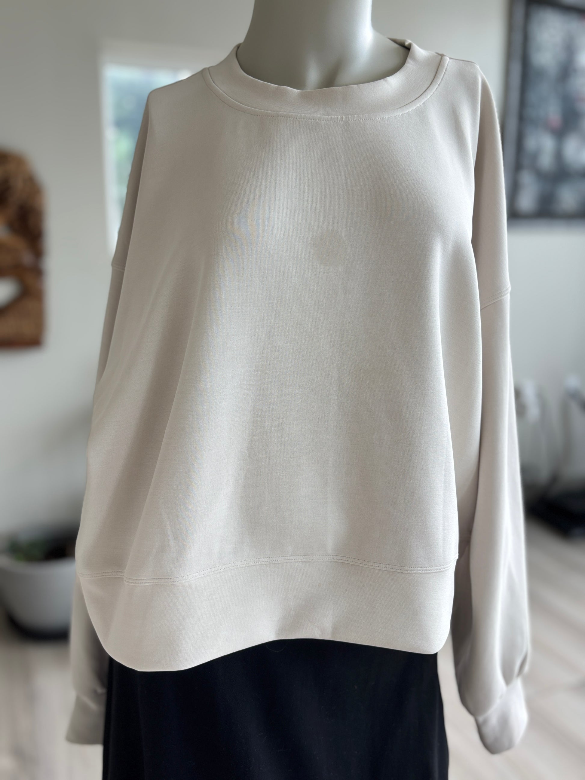 Lululemon oversized ivory sweatshirt crafted from smooth Softstreme modal-blend fabric with a softly weighty drape.