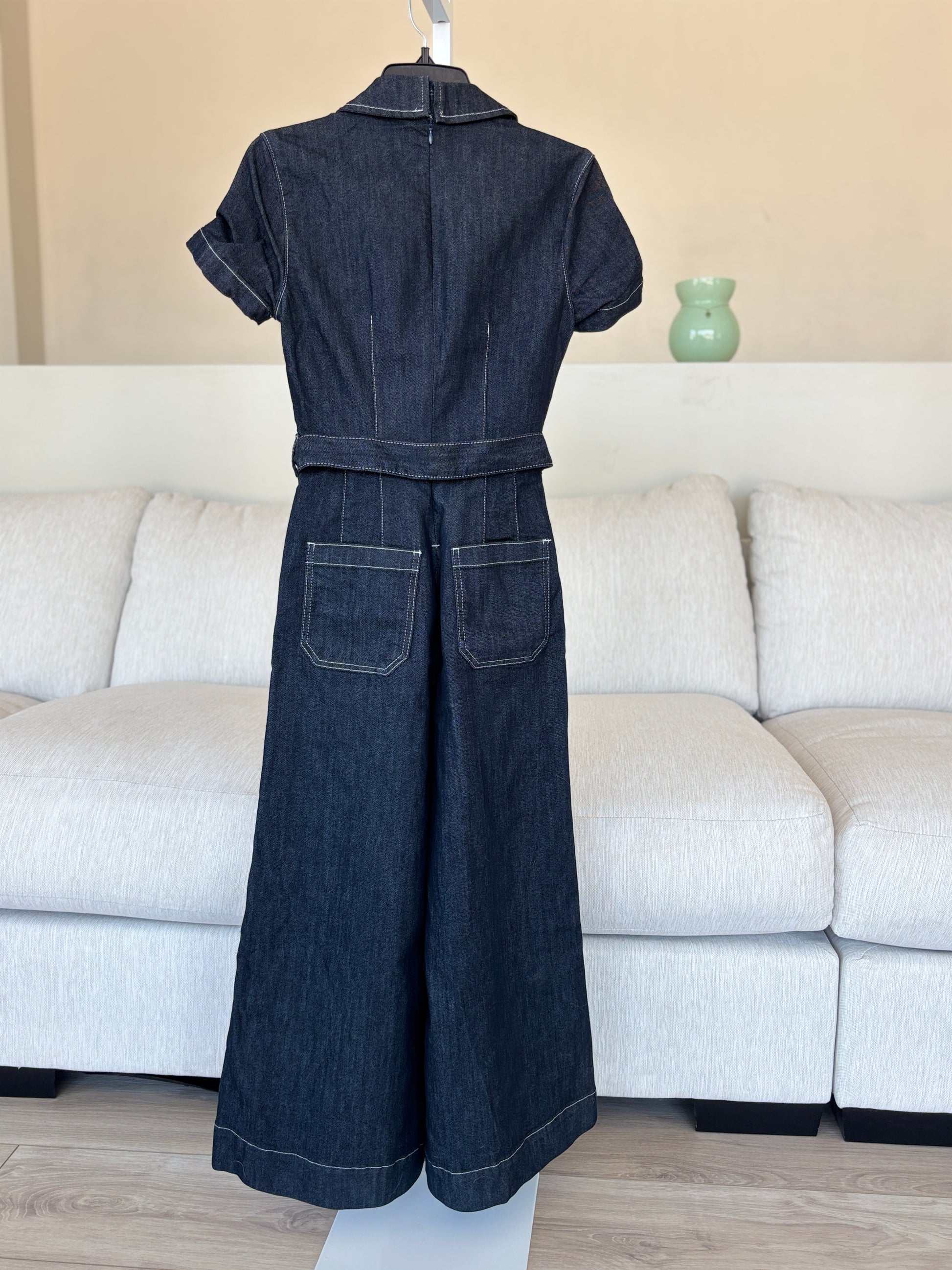  Maeve by Anthropologie denim jumpsuit in size 0 featuring a back zipper, neckline clasp, and cropped wide legs