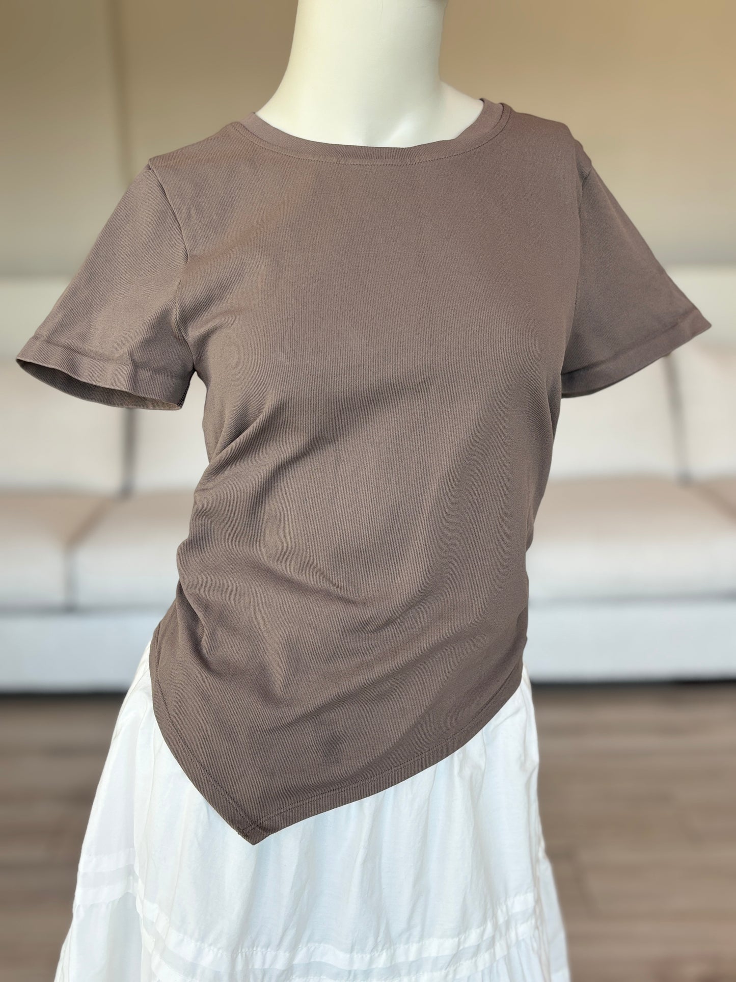 OQQ khaki short sleeve asymmetrical top size large styled for modern casual wear