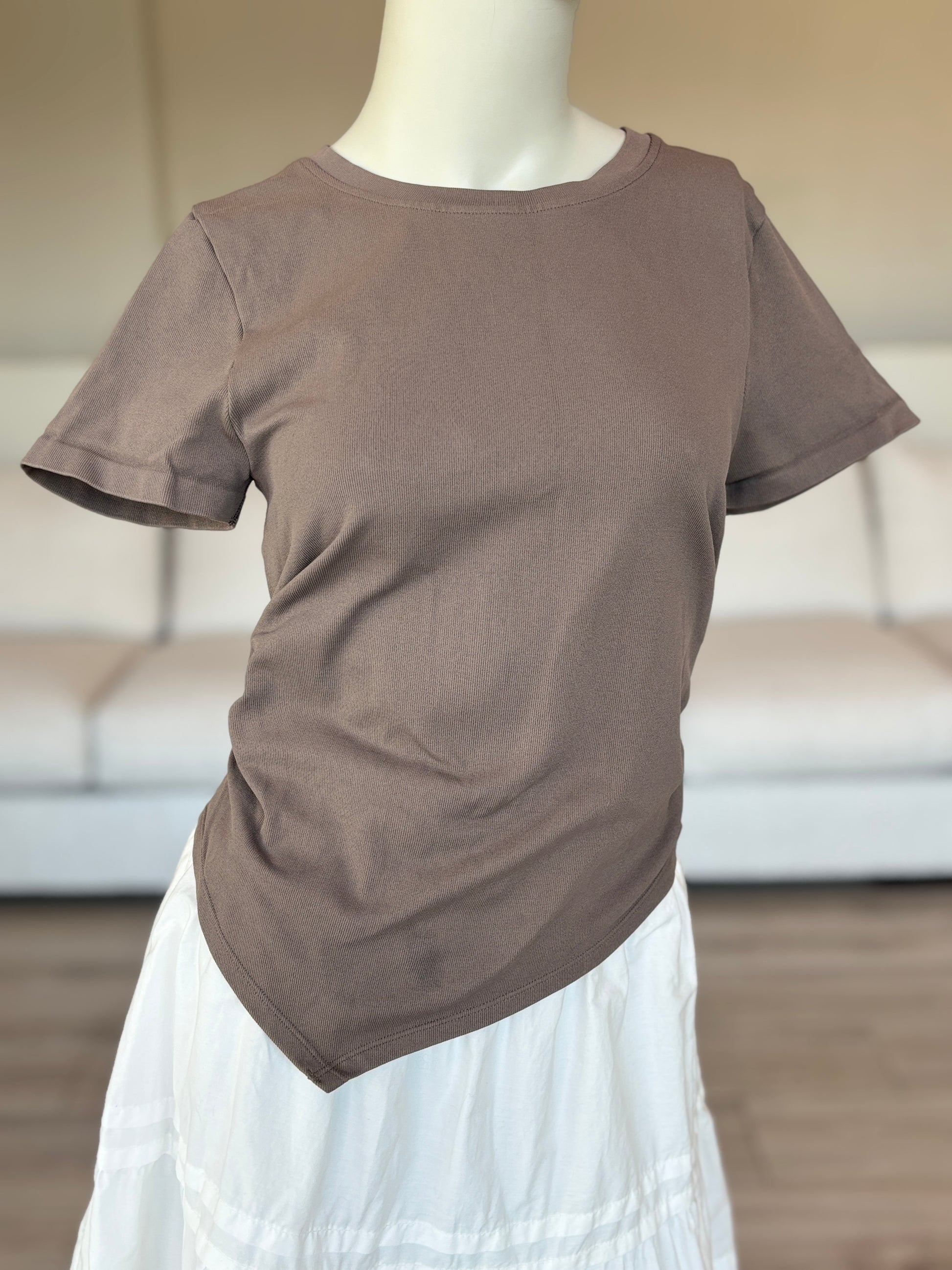 OQQ khaki short sleeve asymmetrical top size large styled for modern casual wear