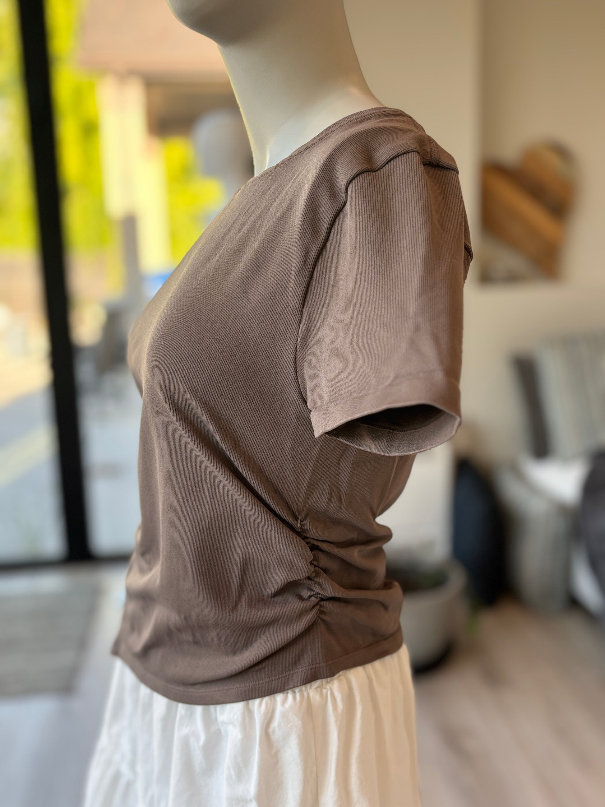 OQQ khaki body skimming stretch shirt size large with flattering ruched sides