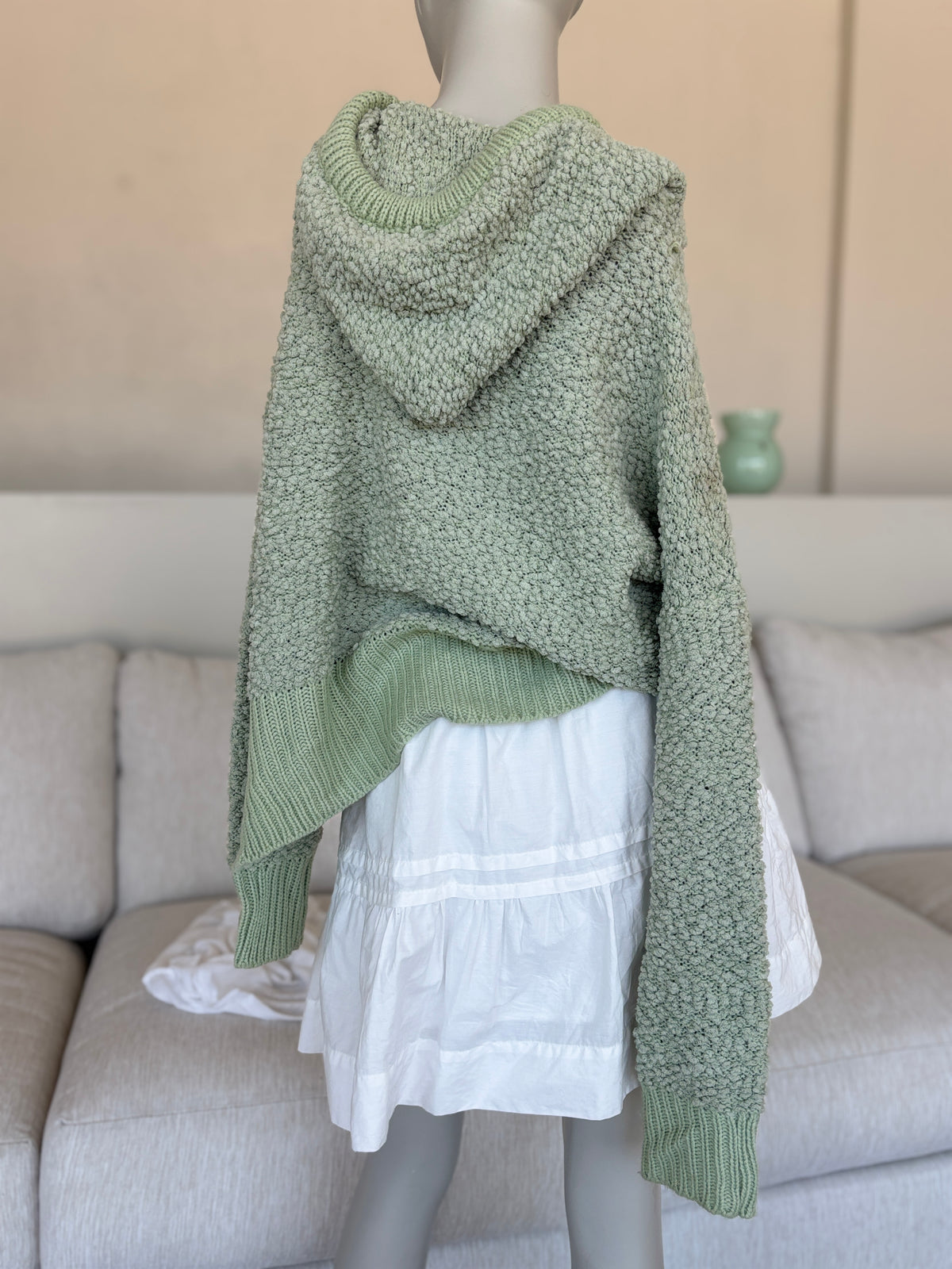 POL textured popcorn-knit pullover with a V-neck, roomy attached hood, and long drawstrings