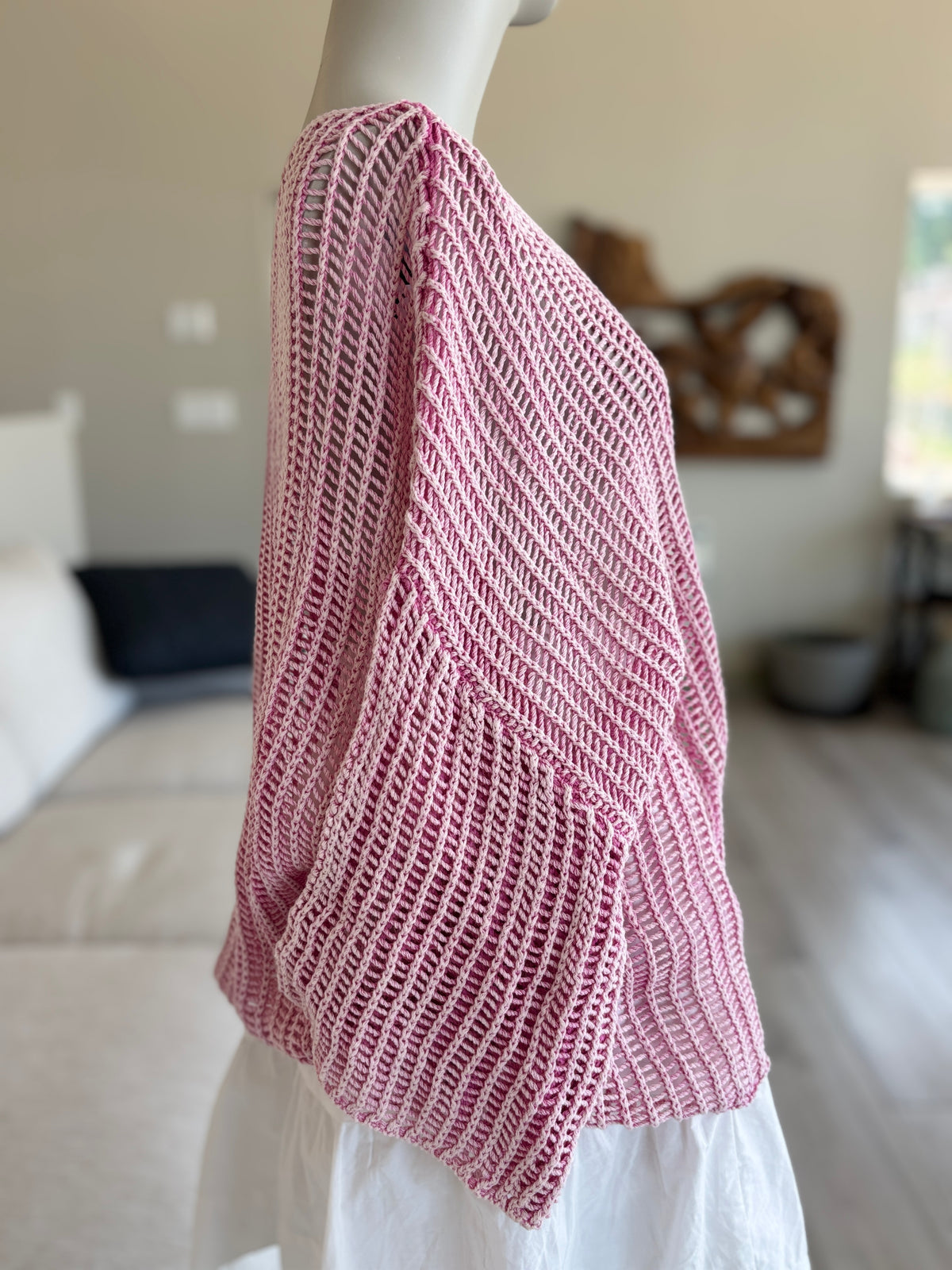 Close view of the Pink Lily top’s rectangular ladder-knit texture in light blush, bubblegum, and raspberry pink