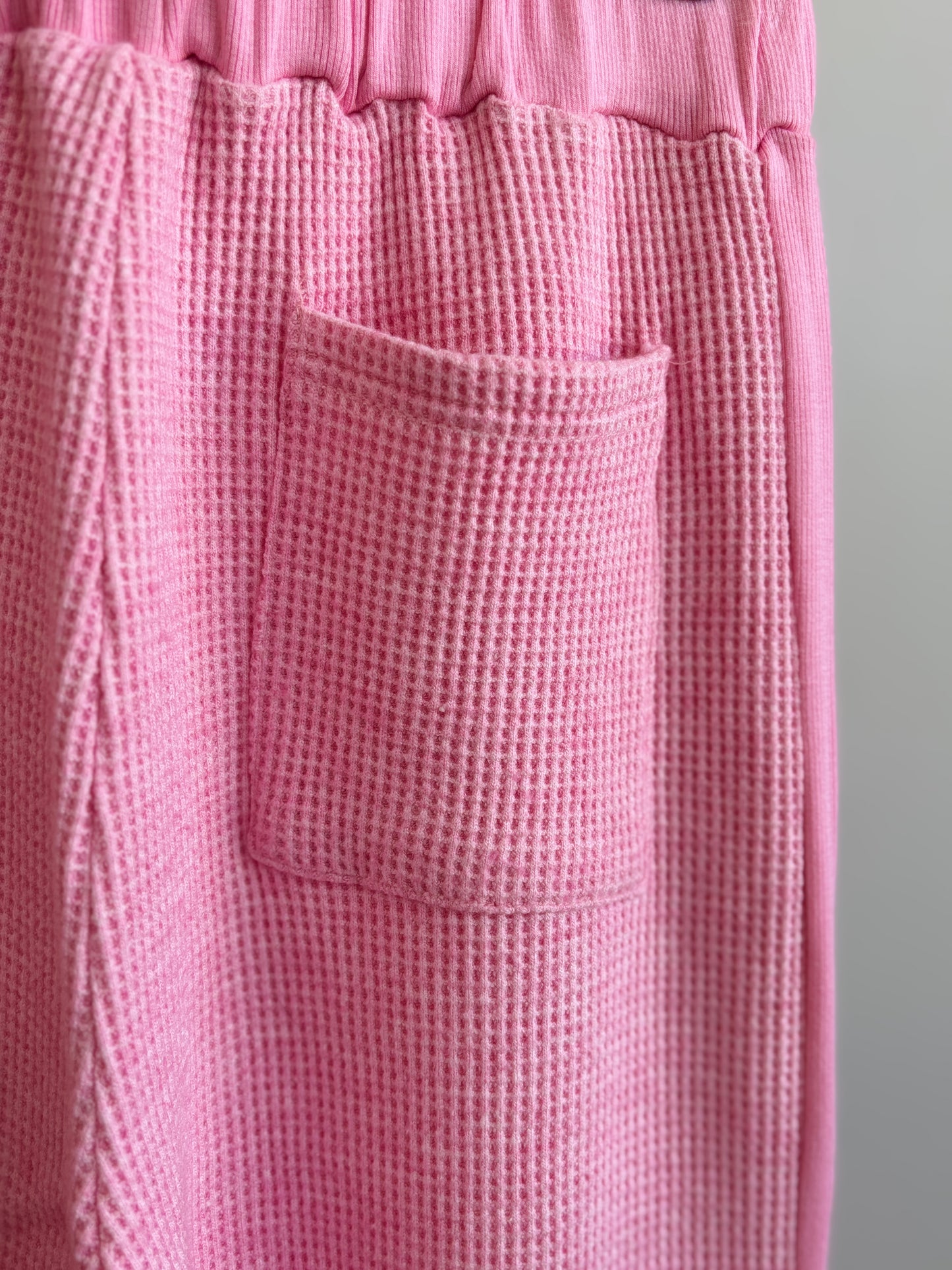 Pink Lily pink rayon blend lounge pants with stretch waist and relaxed wide leg fit from Adored Again boutique