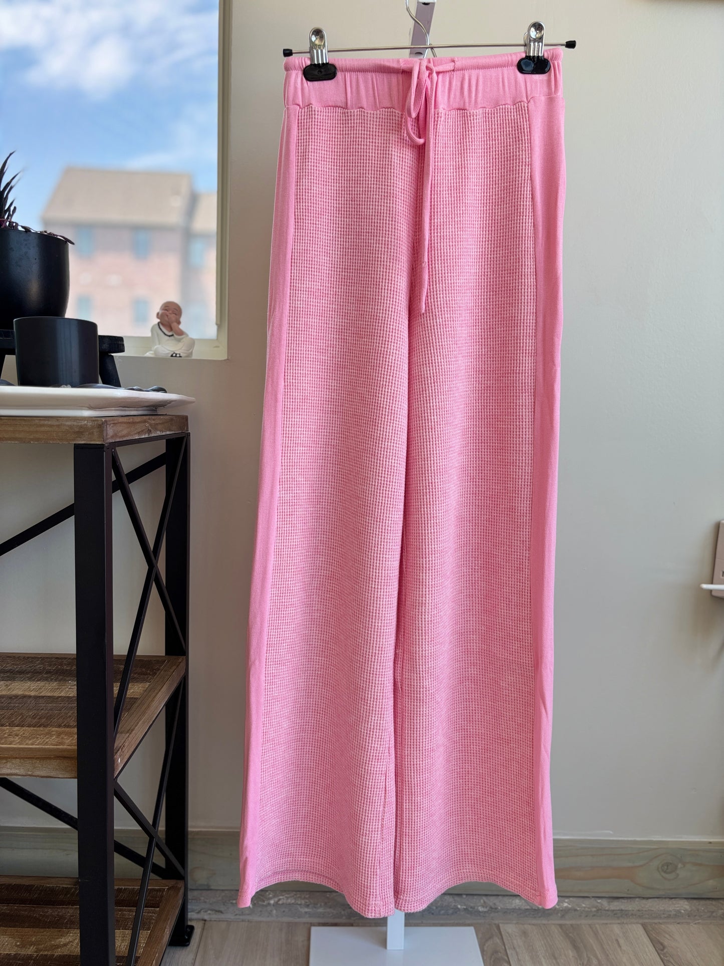 Pink Lily bright pink wide leg lounge pants with elastic tie waist and tonal side panels from Adored Again boutique
