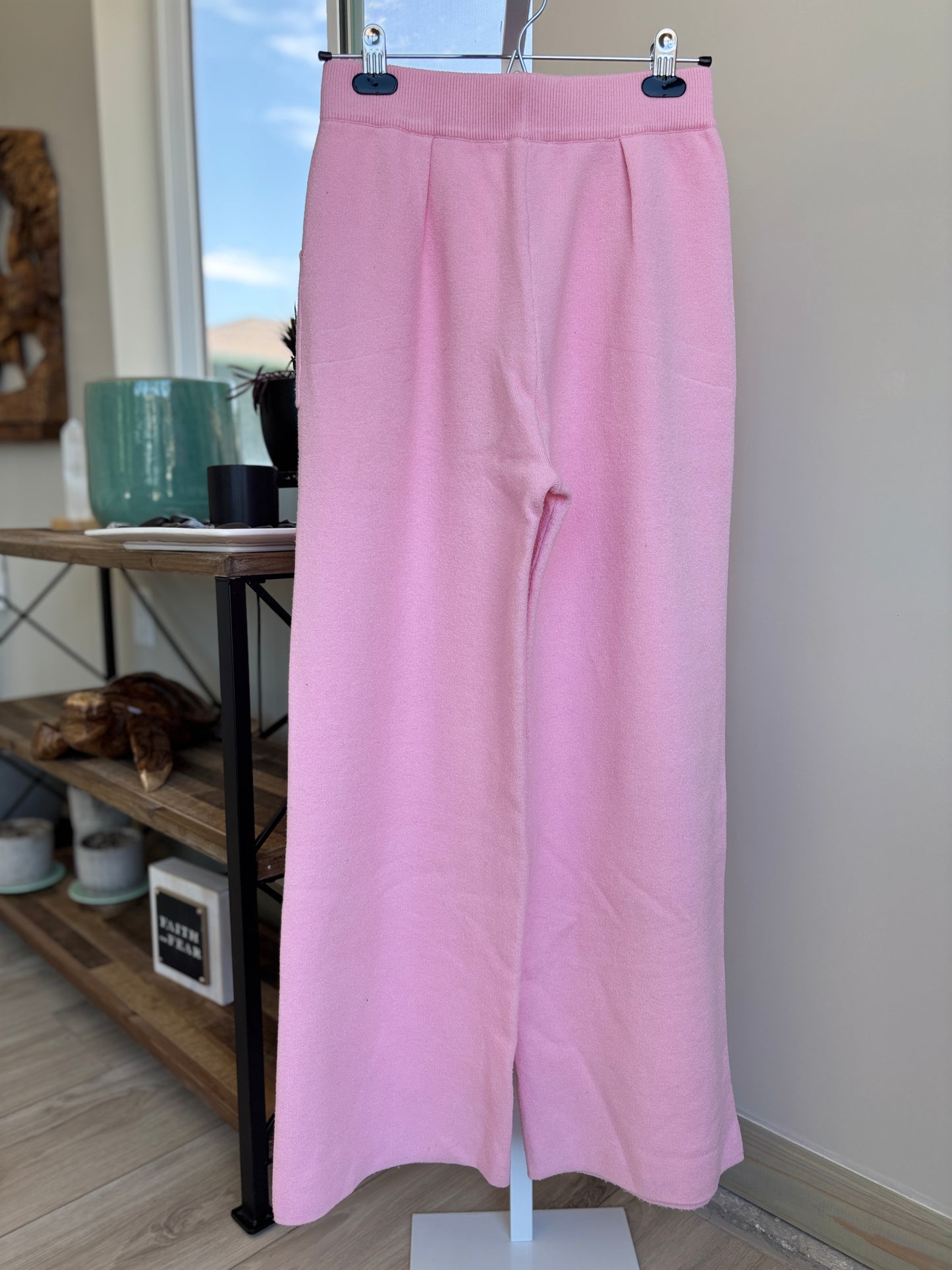Wide leg Pink Lily lounge pants in soft pink knit with square pockets and comfortable pull-on waist from Adored Again boutique