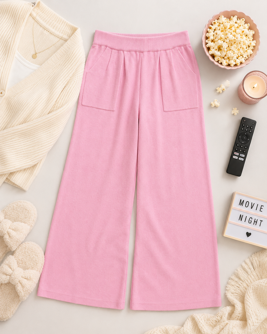 Soft pink Pink Lily lounge pants in size small with pleated waistband detail and wide leg silhouette at Adored Again boutique