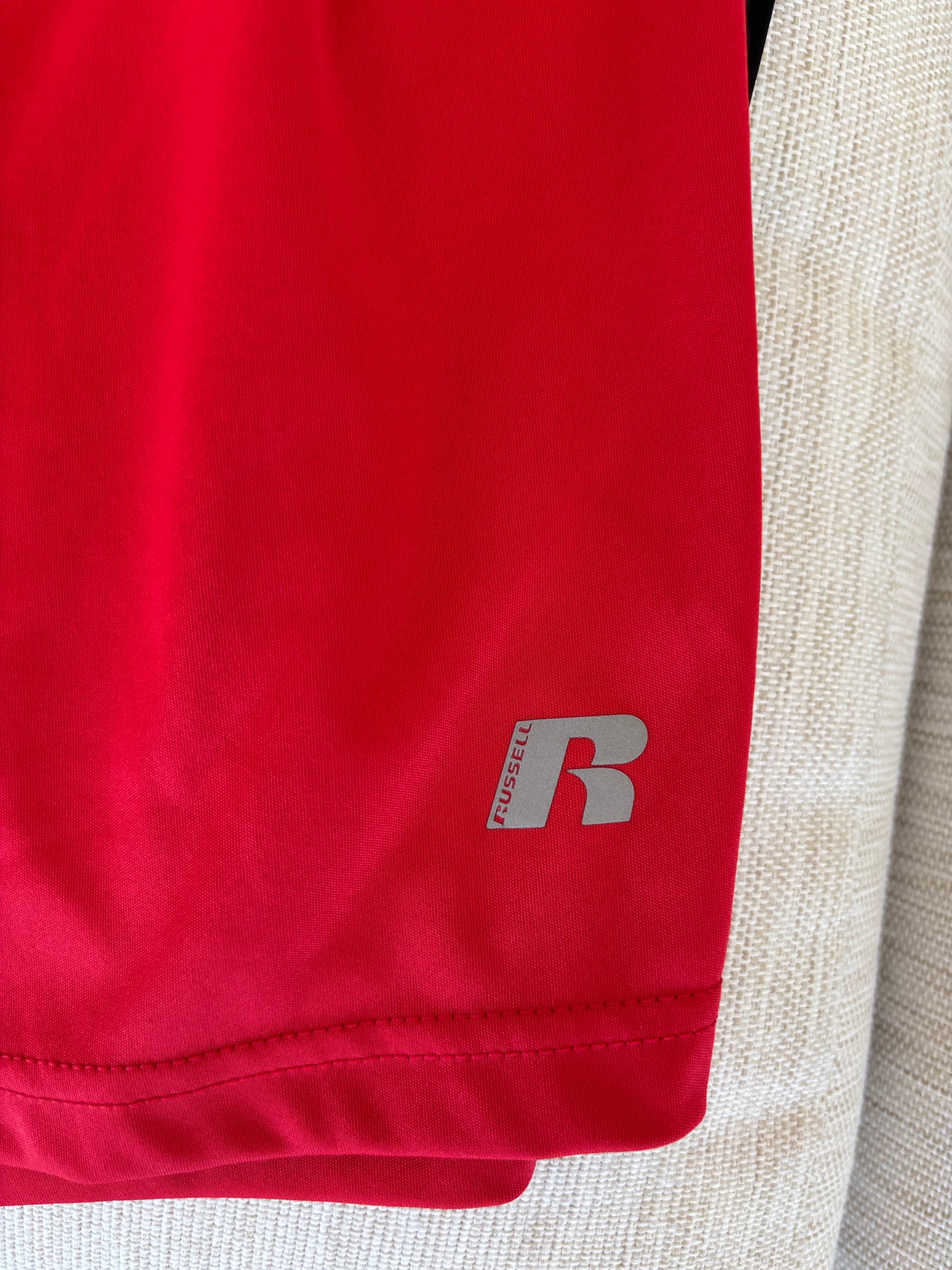 Russell men’s red performance shorts with black side detail