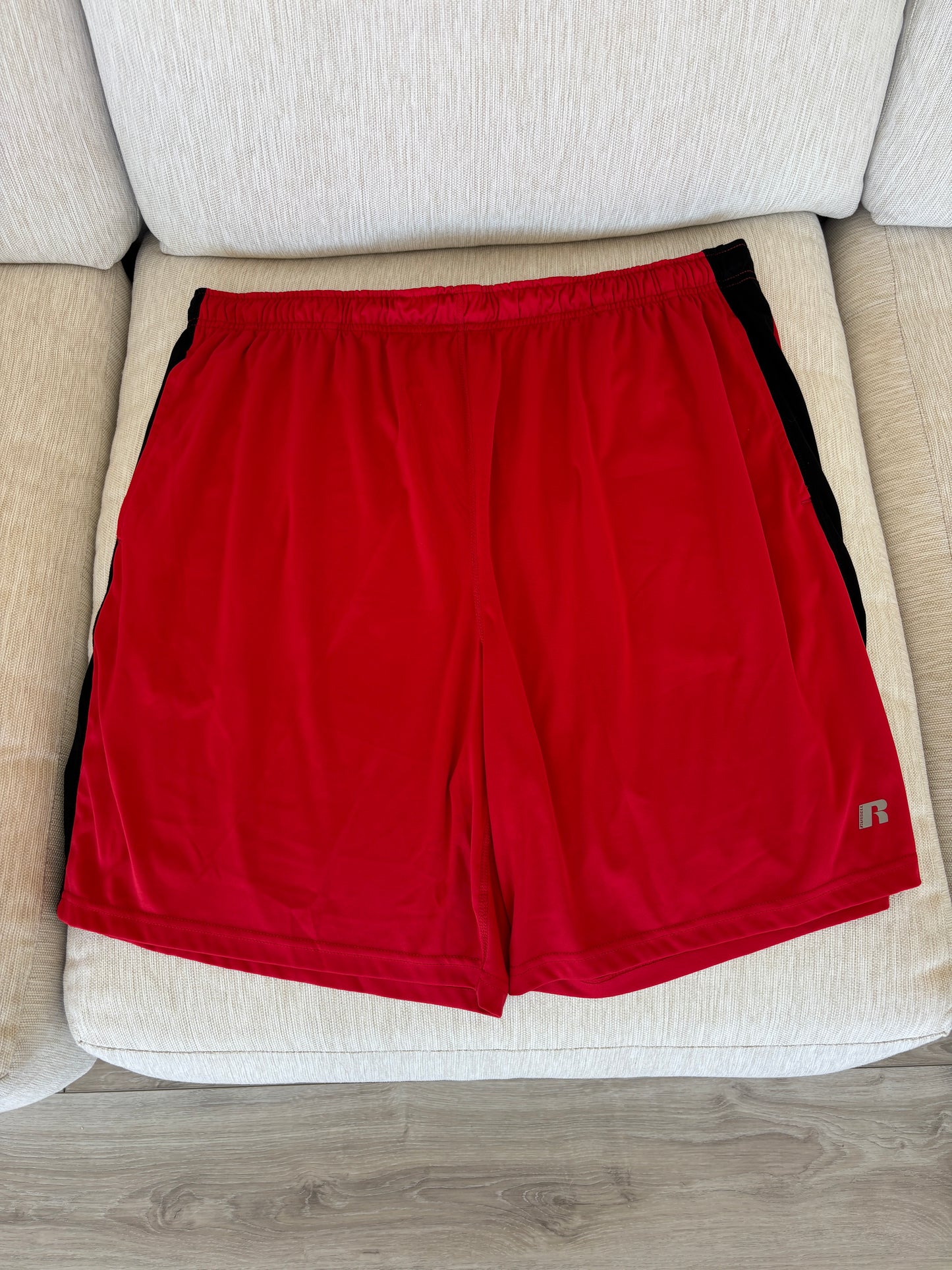Men’s Russell relaxed fit polyester shorts size 2XL flat lay