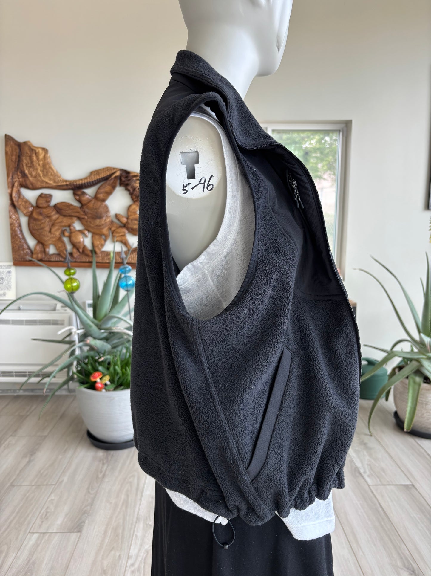 lululemon zip vest black fleece with relaxed fit and fold over collar warm lightweight layering piece