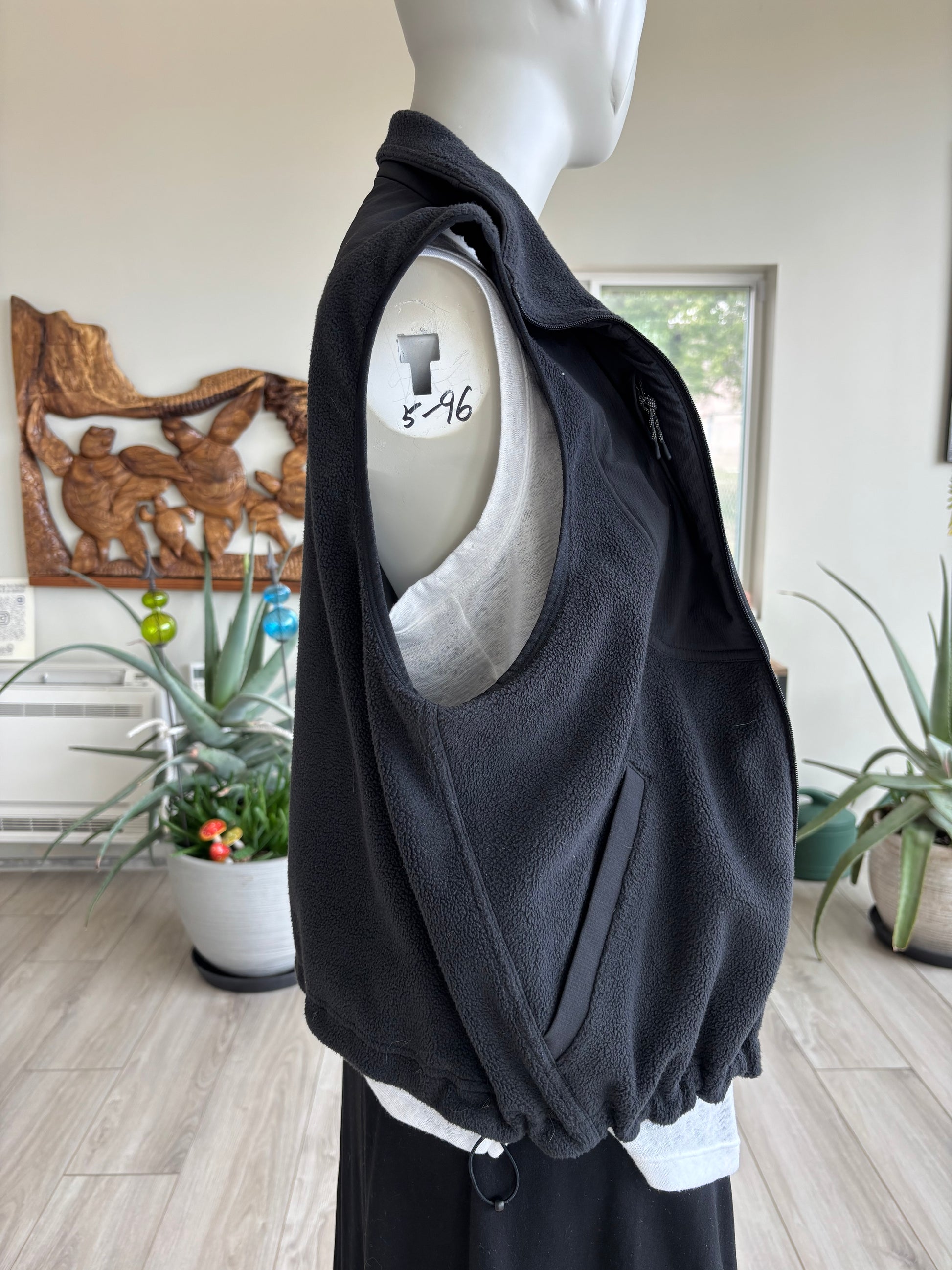lululemon zip vest black fleece with relaxed fit and fold over collar warm lightweight layering piece