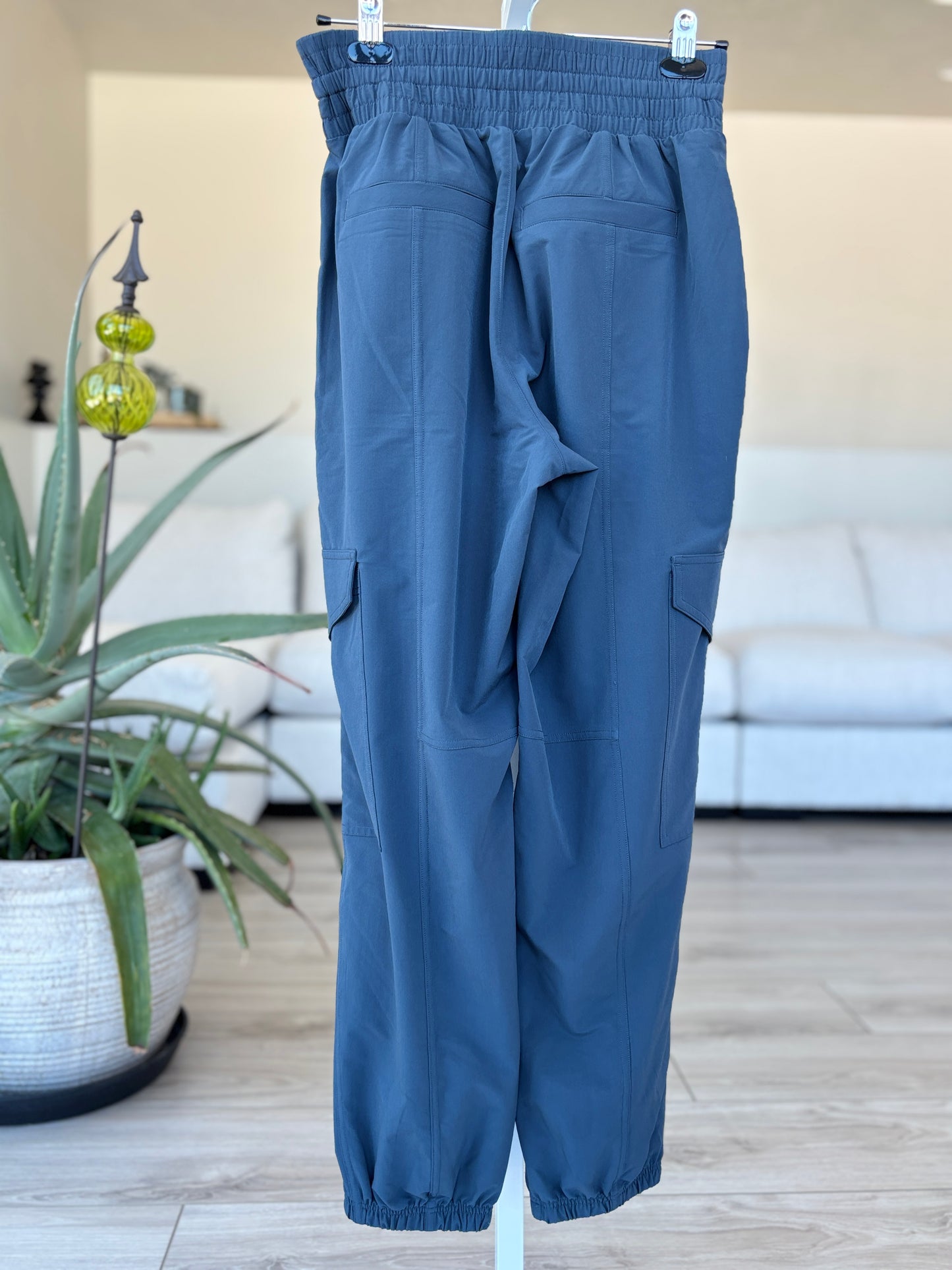 Blue green Spanx utility joggers with elastic waistband and smooth stretch fabric