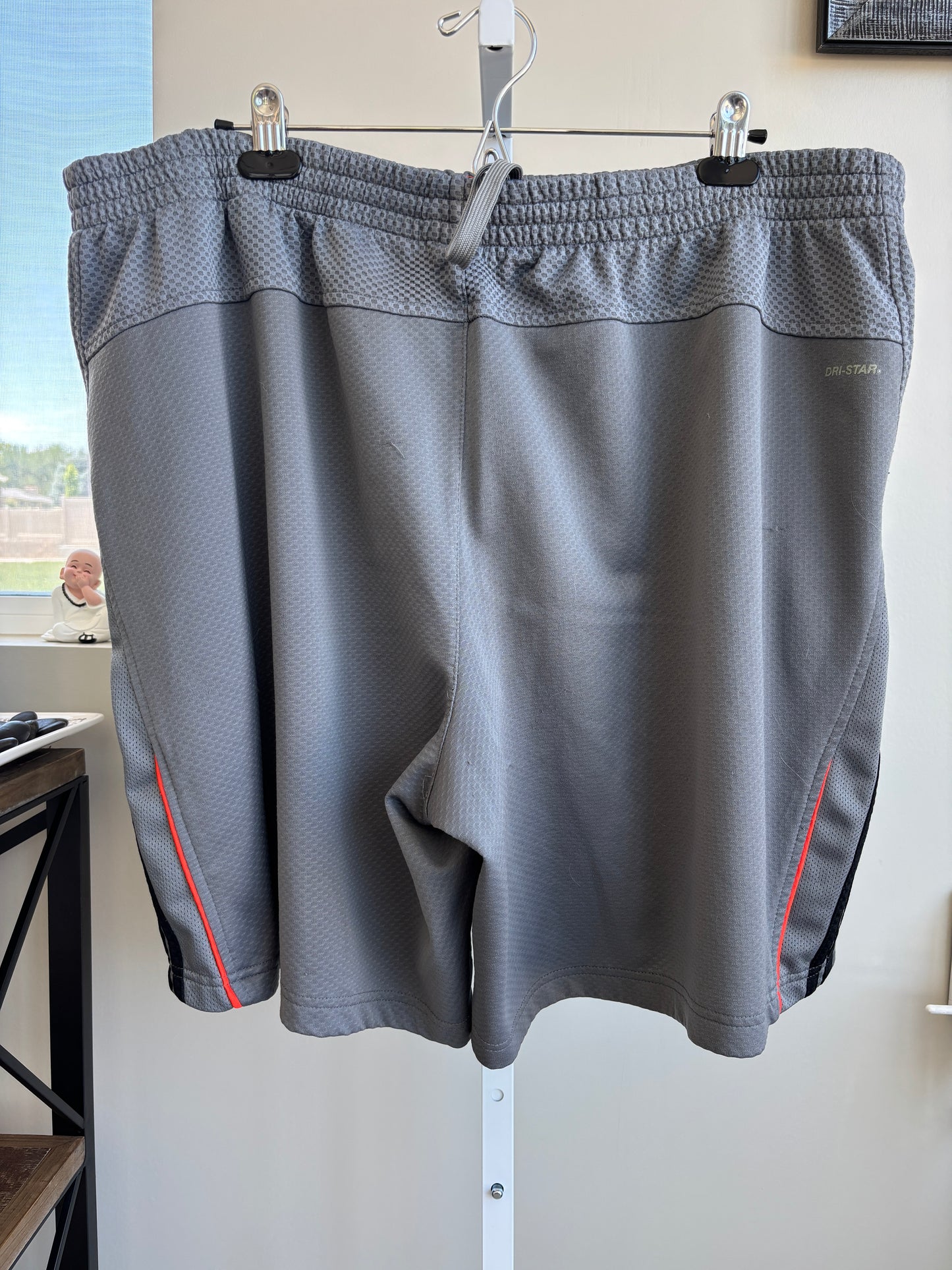 Dark gray Starter gym shorts for men with orange waistband detail