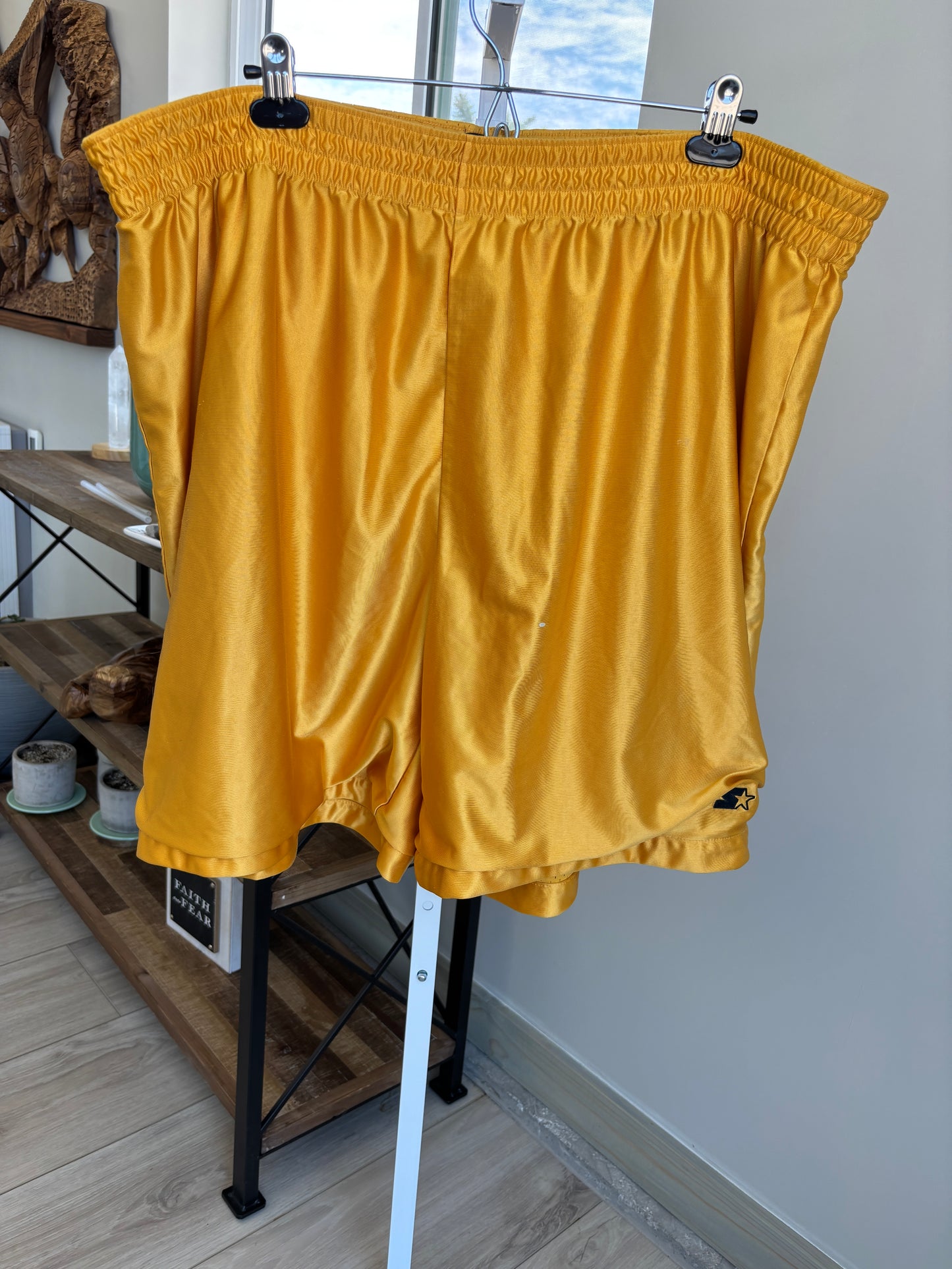 Men’s Starter athletic shorts with finished seams on both sides