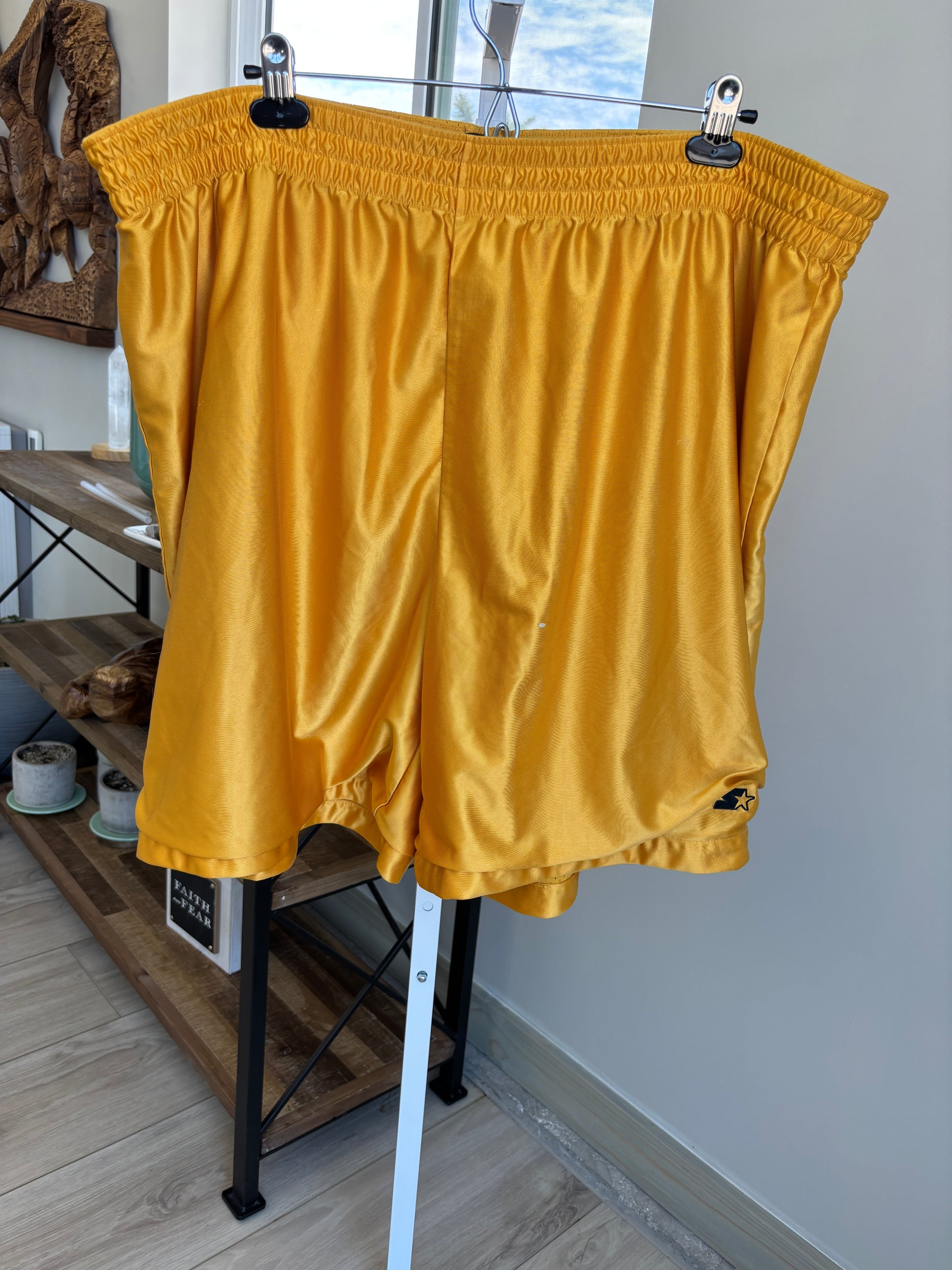 Men’s Starter athletic shorts with finished seams on both sides