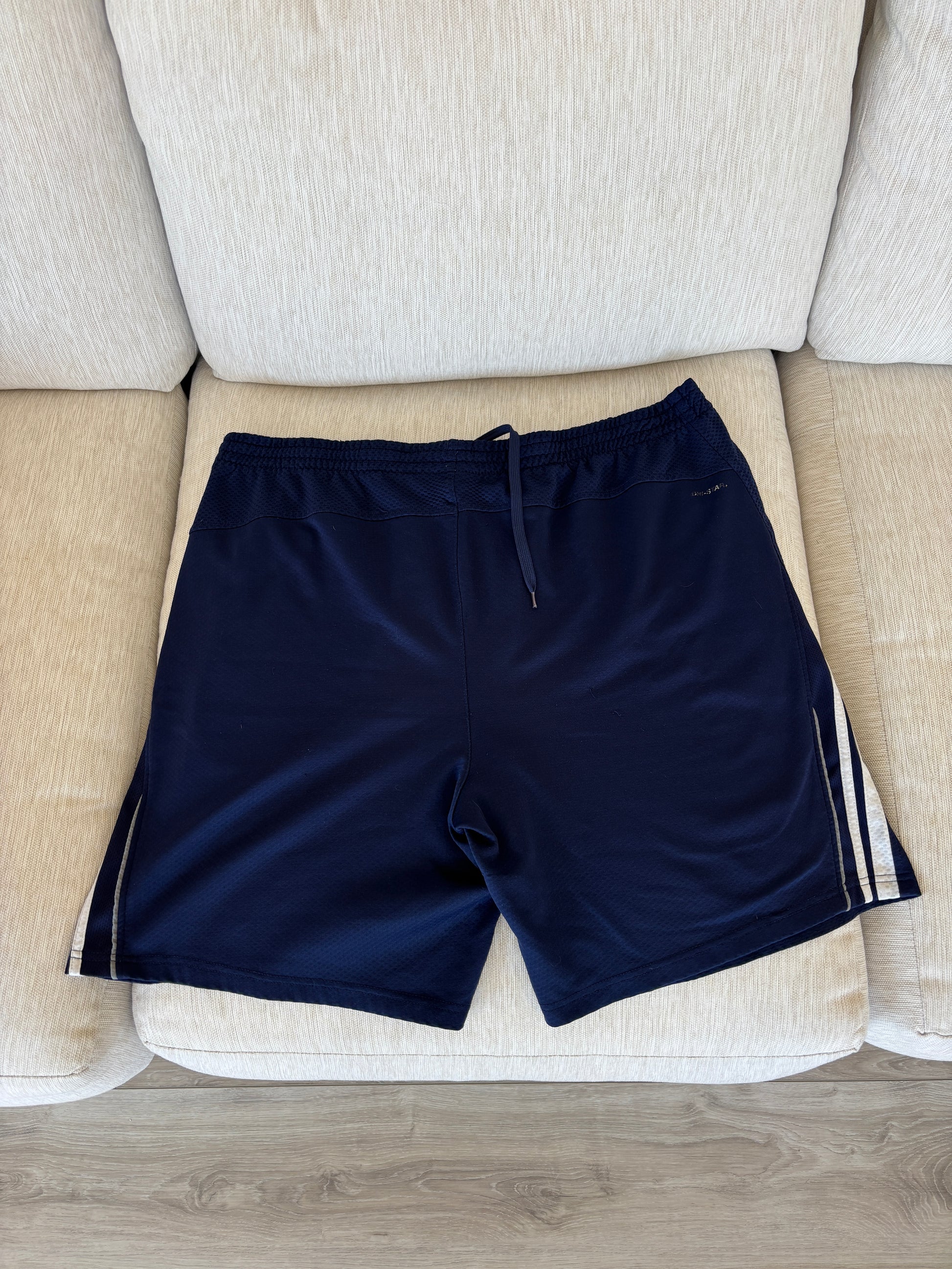 Men’s Starter polyester performance shorts size XL flat lay