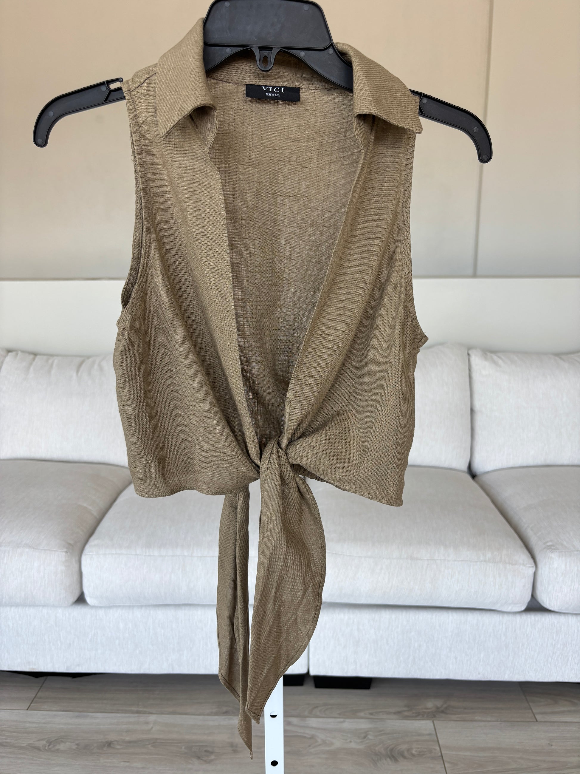 VICI sleeveless vest and jumpsuit set in taupe linen blend fabric with polished vacation style.
