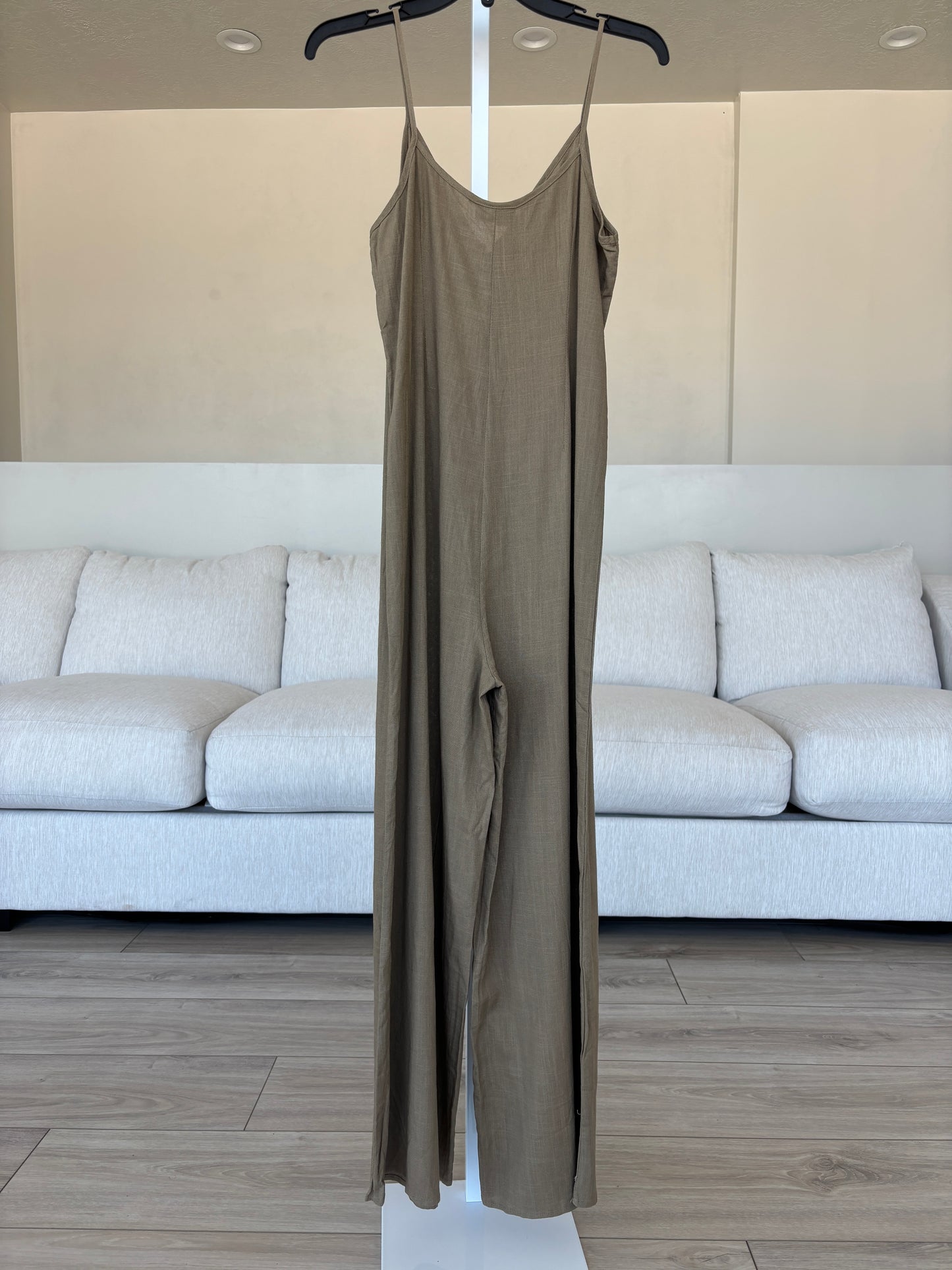 VICI taupe jumpsuit and tie-front vest styled with sandals for an elegant summer rooftop outfit.