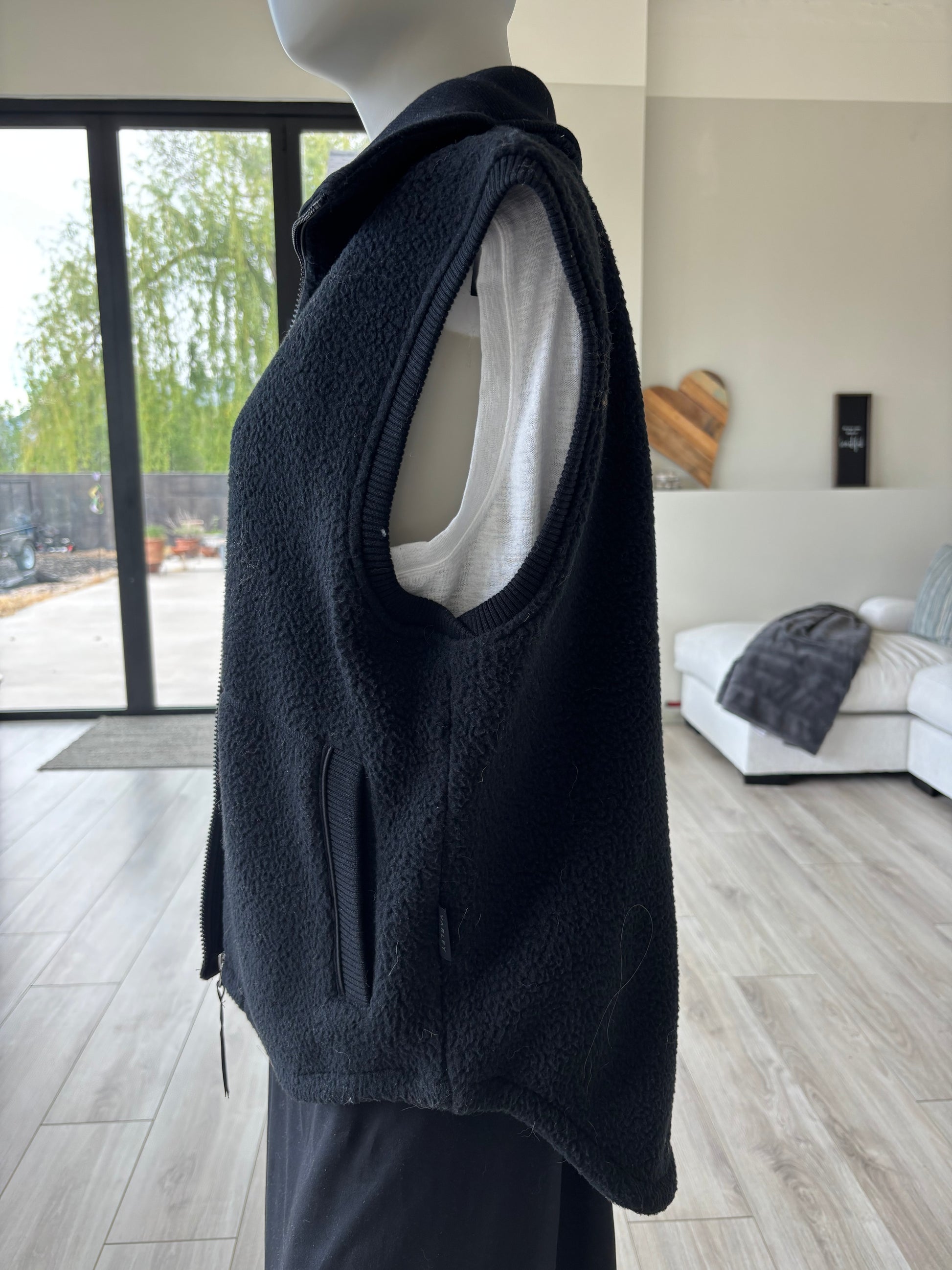 Varley - Great for coverage, the back is longer than the front, soft, no sleeves